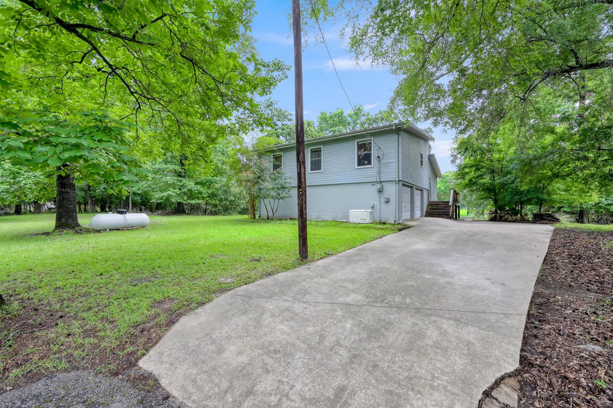 Image 3: Set on a full acre in The Landing on Lake Livingst