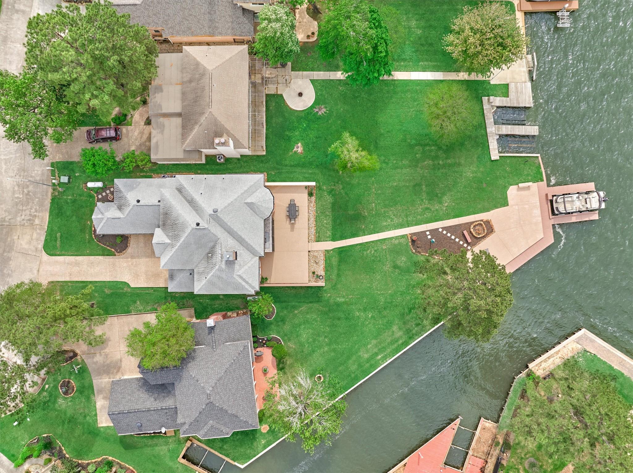 Image 4: The bird's eye view reveal the expansive back yard