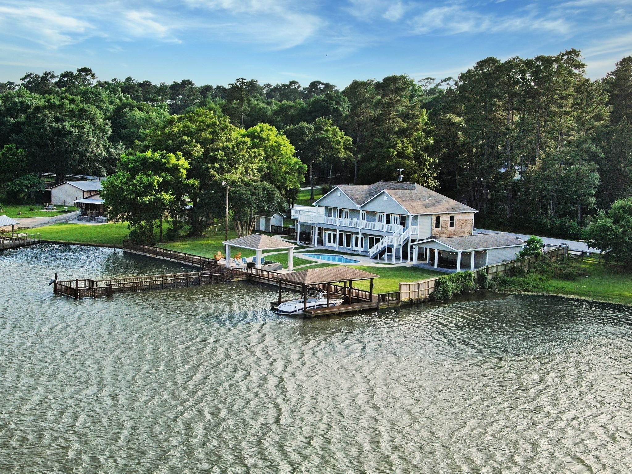 Image 2: Property features an attached 2 car garage, 2 stor