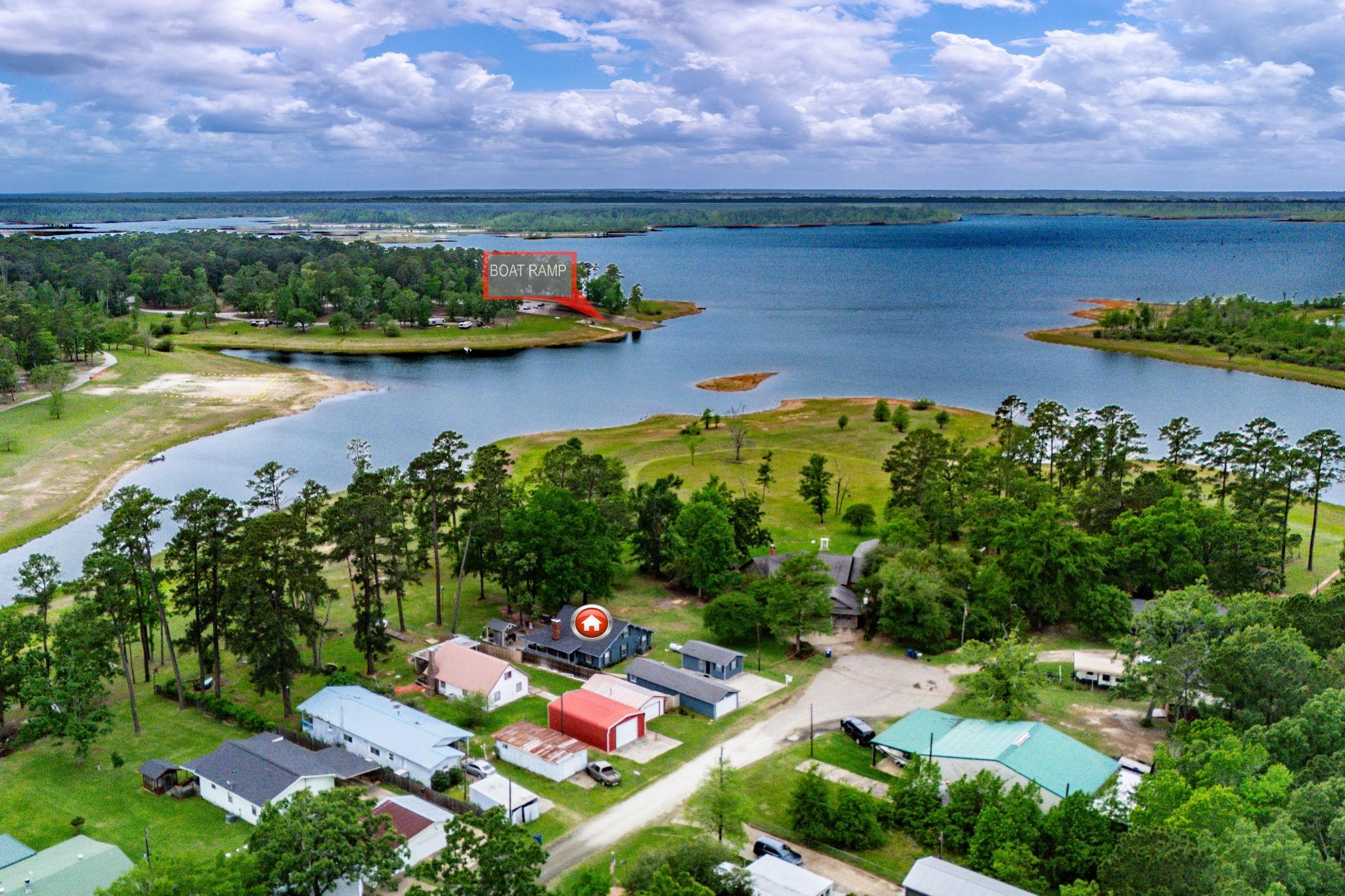 Image 1: An aerial perspective reveals this property&rsquo;s prem