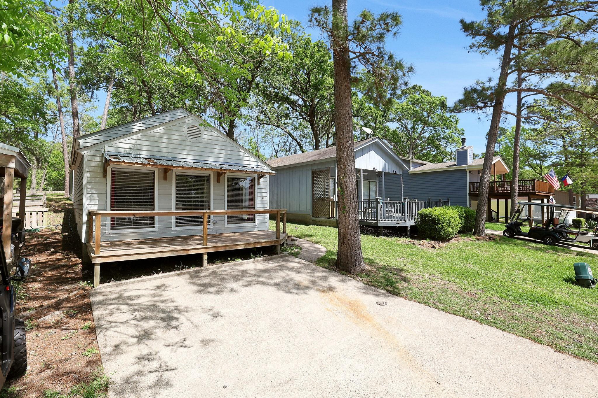 Image 2: This cute home has its own private driveway