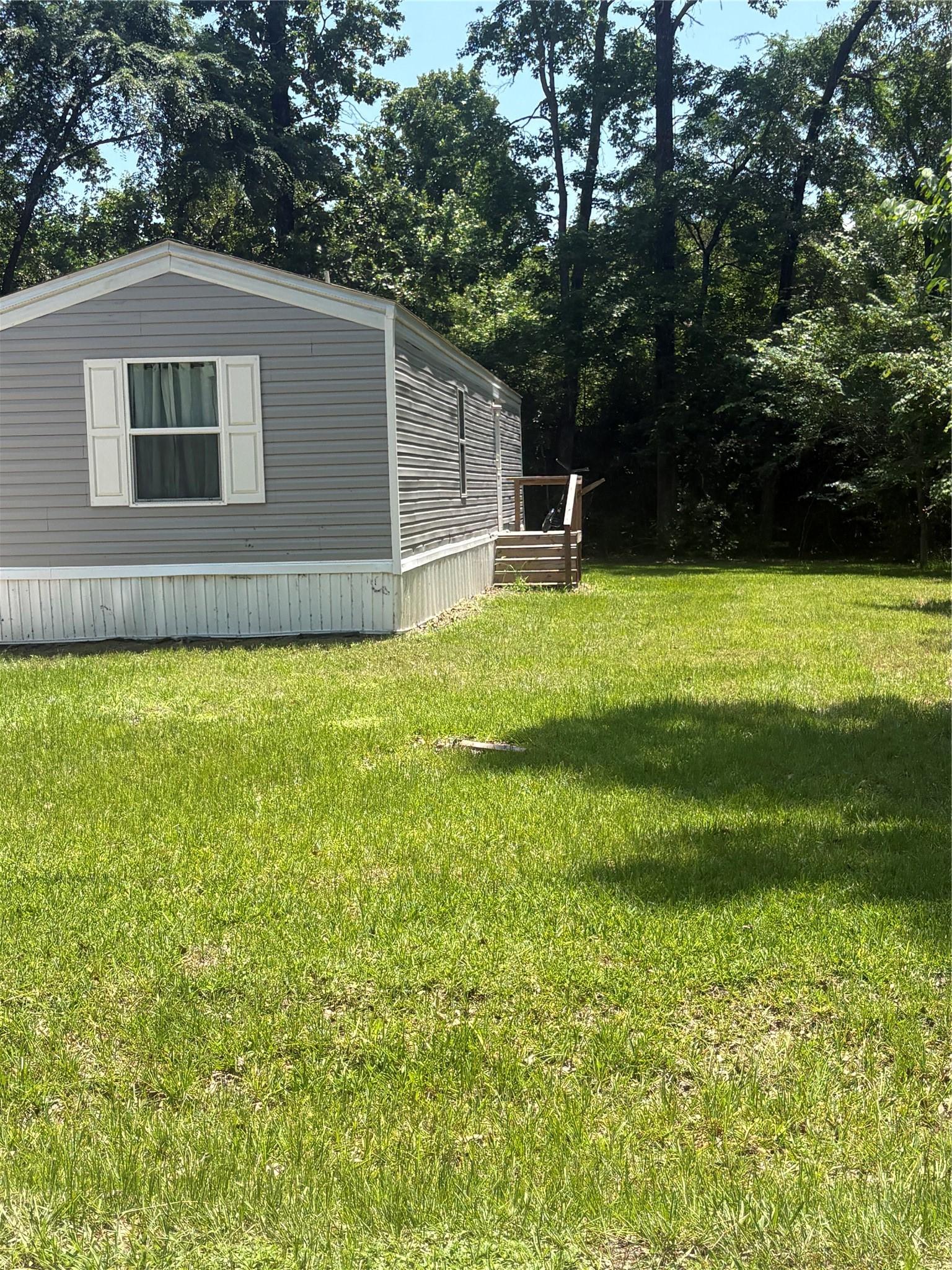 Image 2: Home - Side View with Porch
