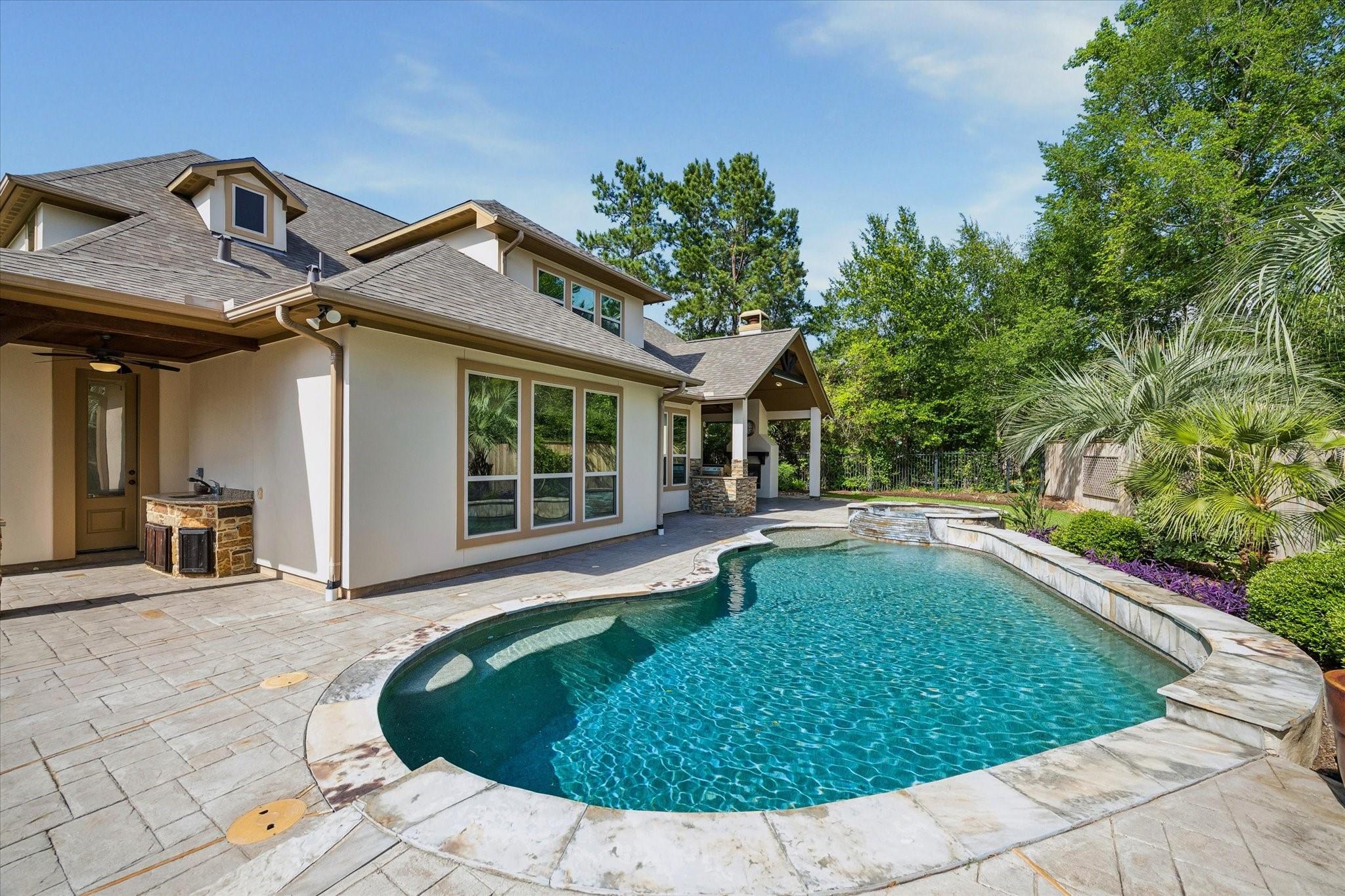 Image 2: Another view of the pool and the service sink and
