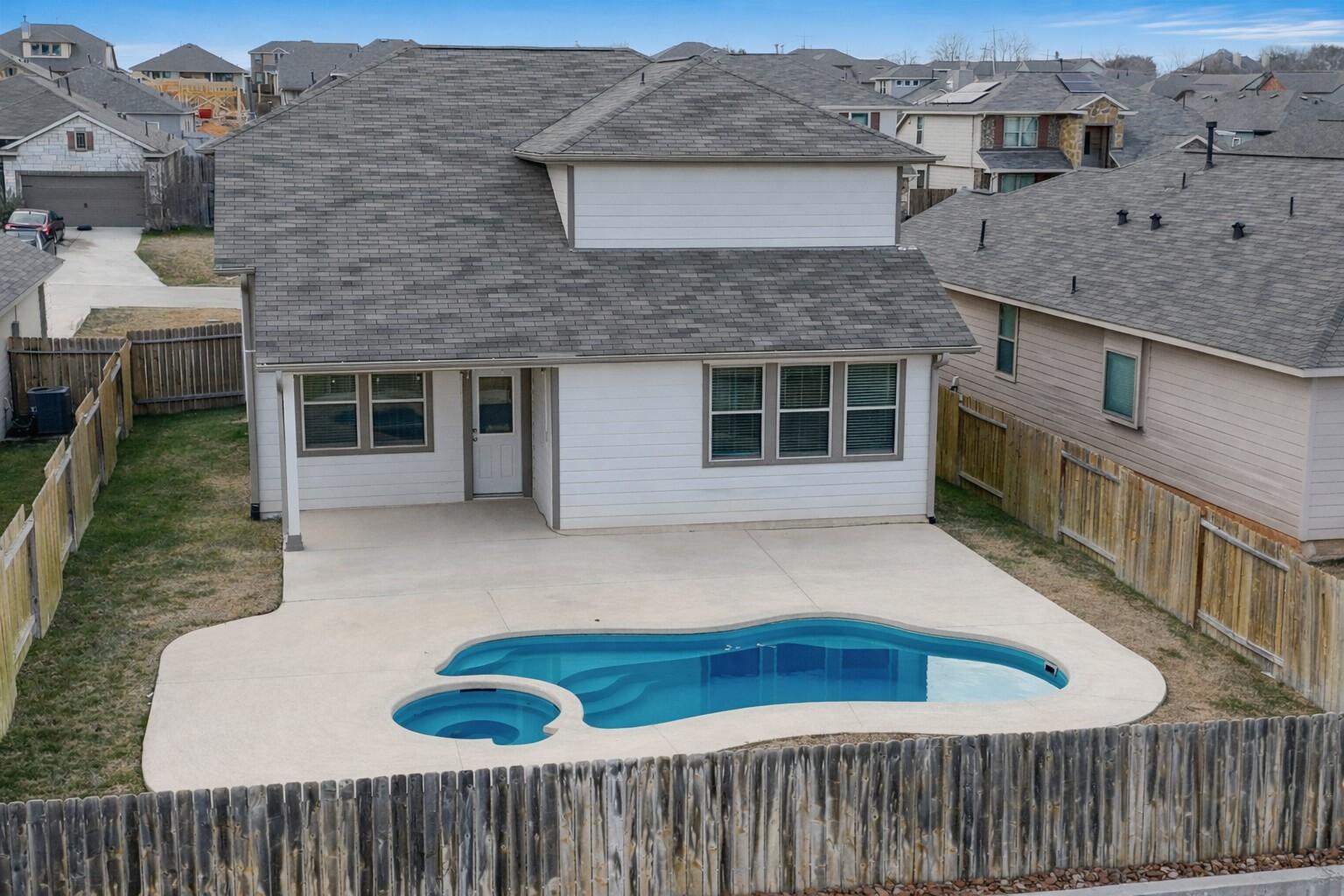 Image 3: Property boasts pool and spa with ample decking.