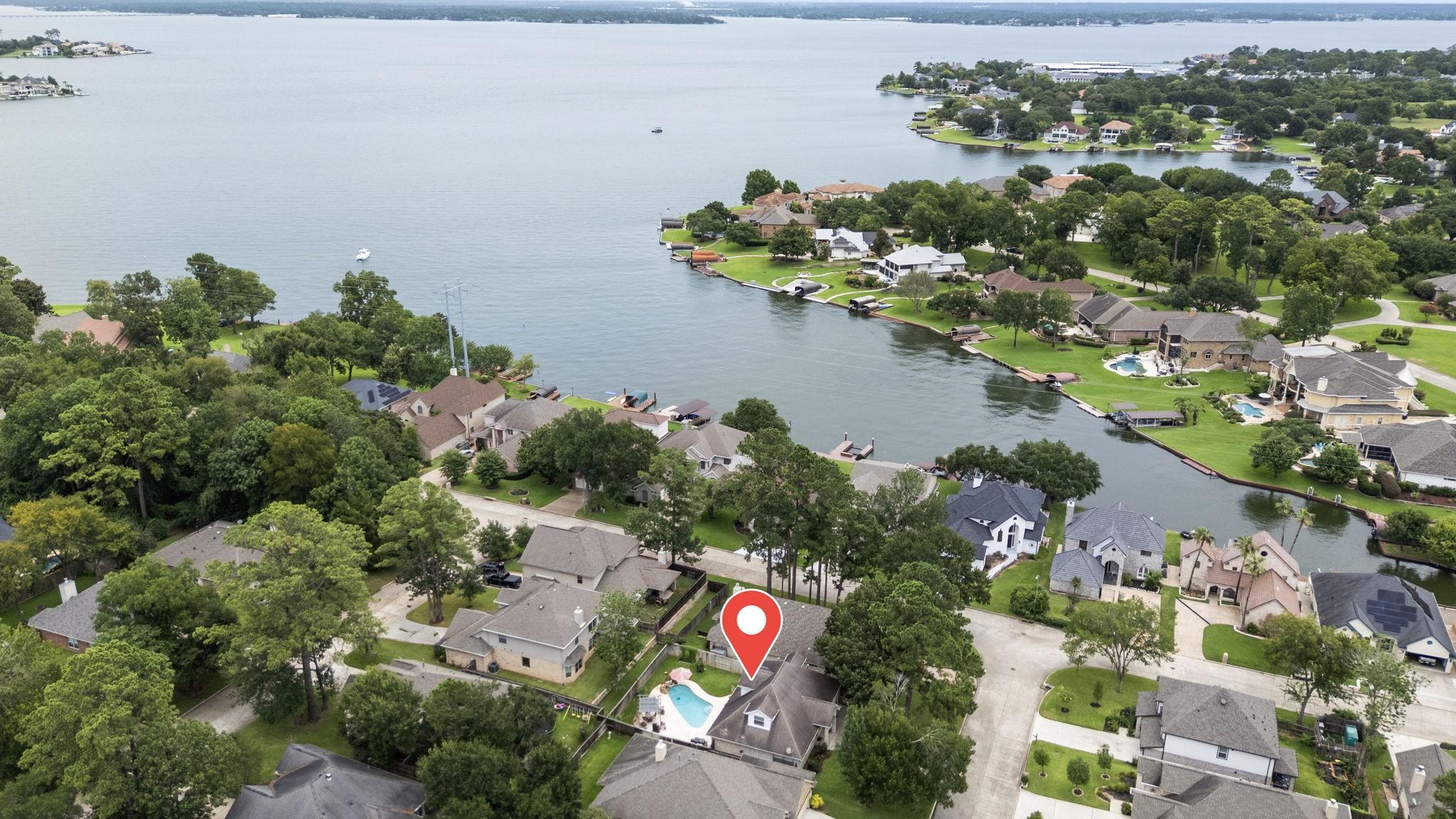 Image 3: Just steps from the lake, this beautiful home offe