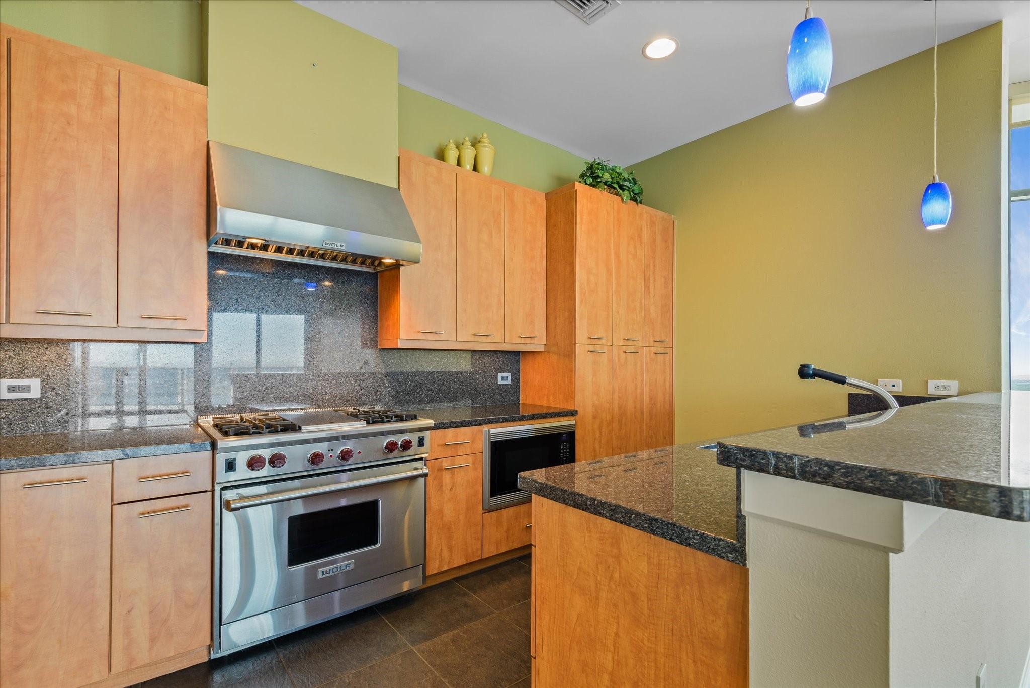 Image 3: Designer appliances and plenty of storage & prep s