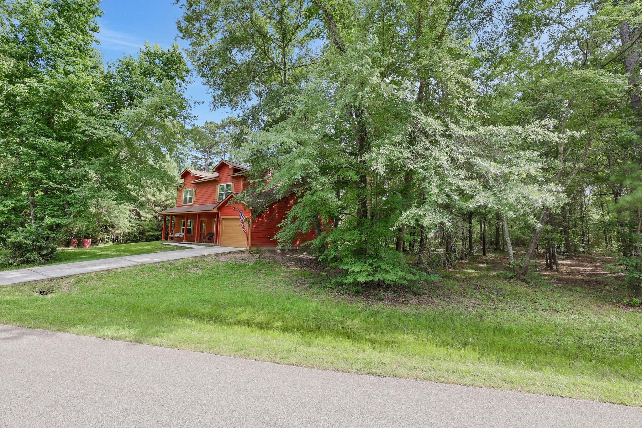 Image 2: The property comes with TWO lots totaling 0.89 acr