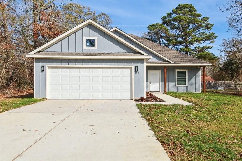 Image 2: Spacious driveway offering ample parking and easy