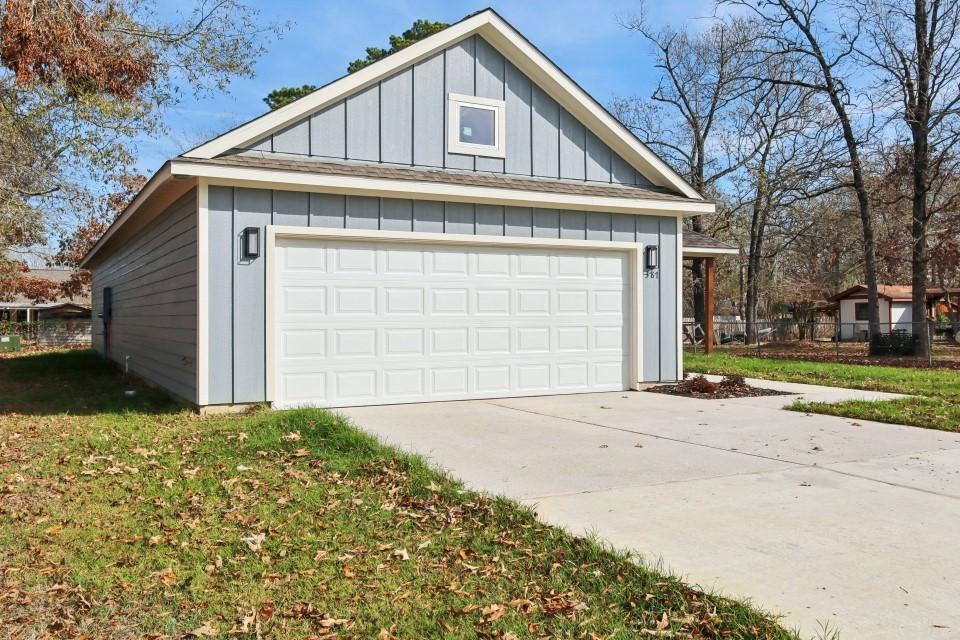 Image 3: Spacious two-car garage offering convenience and a