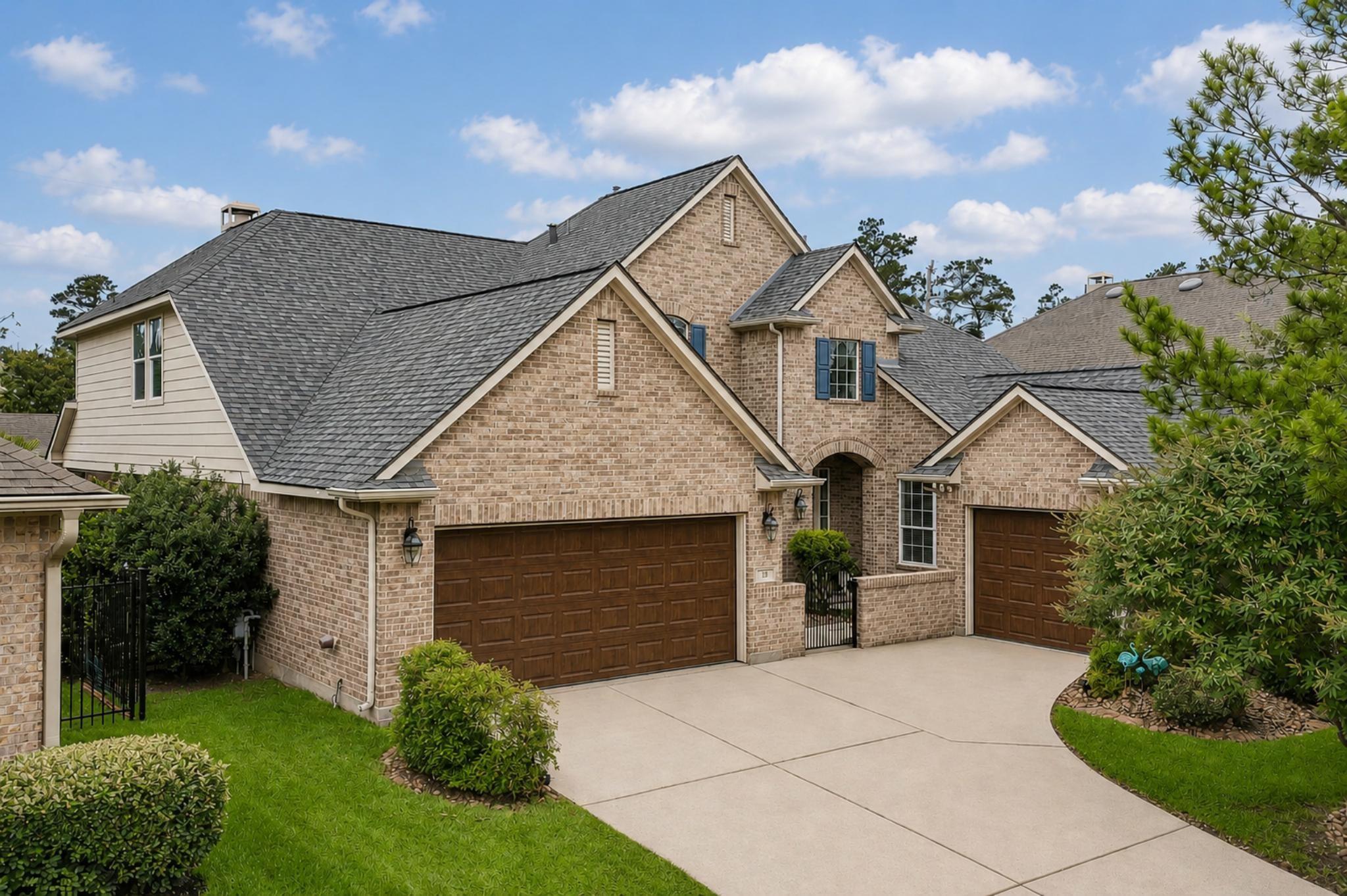 Image 1: Strong curb appeal, professional landscaping, new