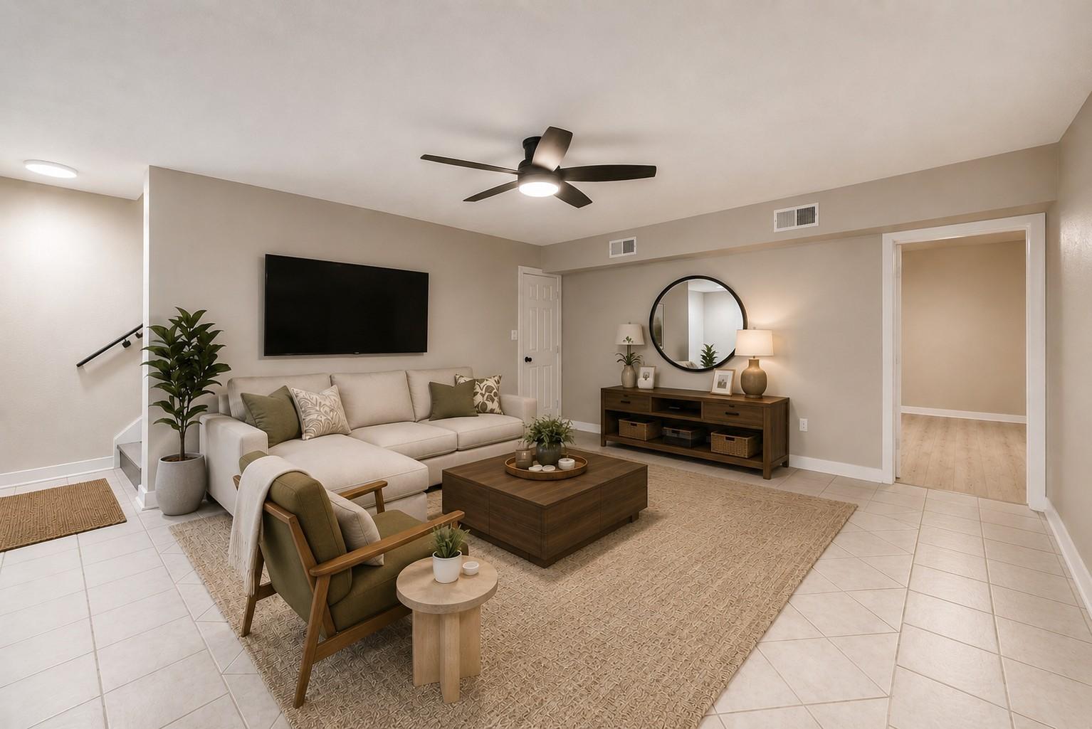 Image 4: This inviting living room serves as the entryway,