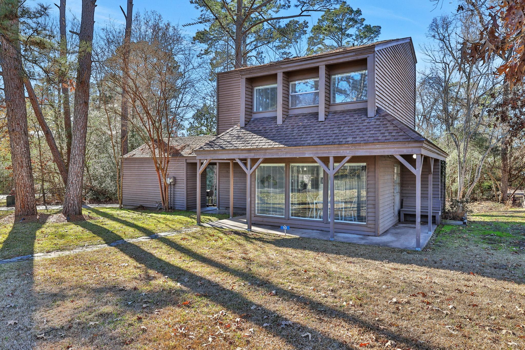 Image 3: The two story home on a corner lot is full of char