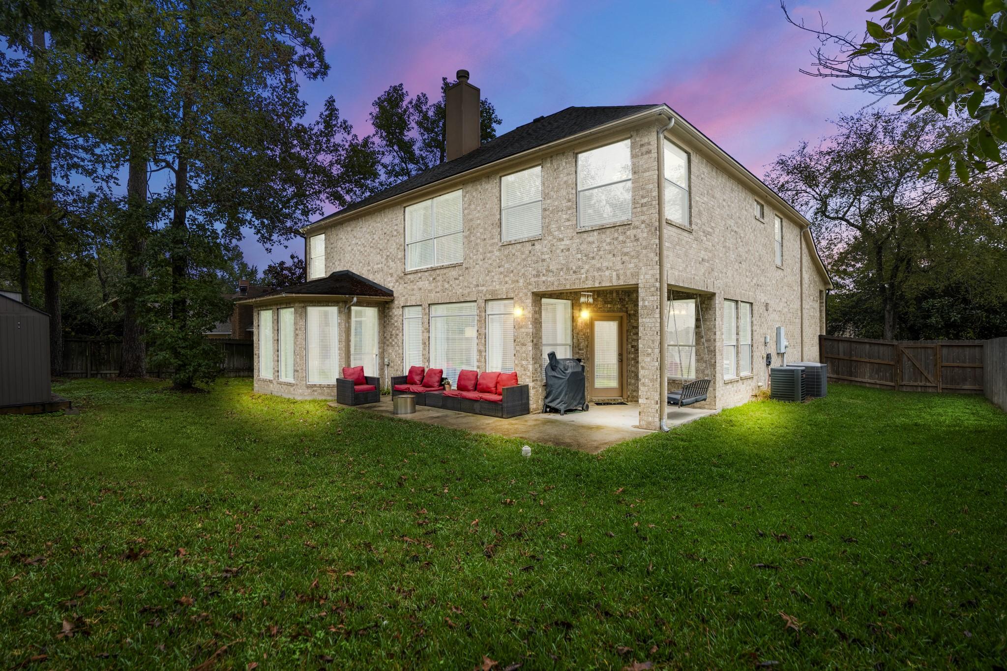 Image 3: Expansive backyard has room for it all!
