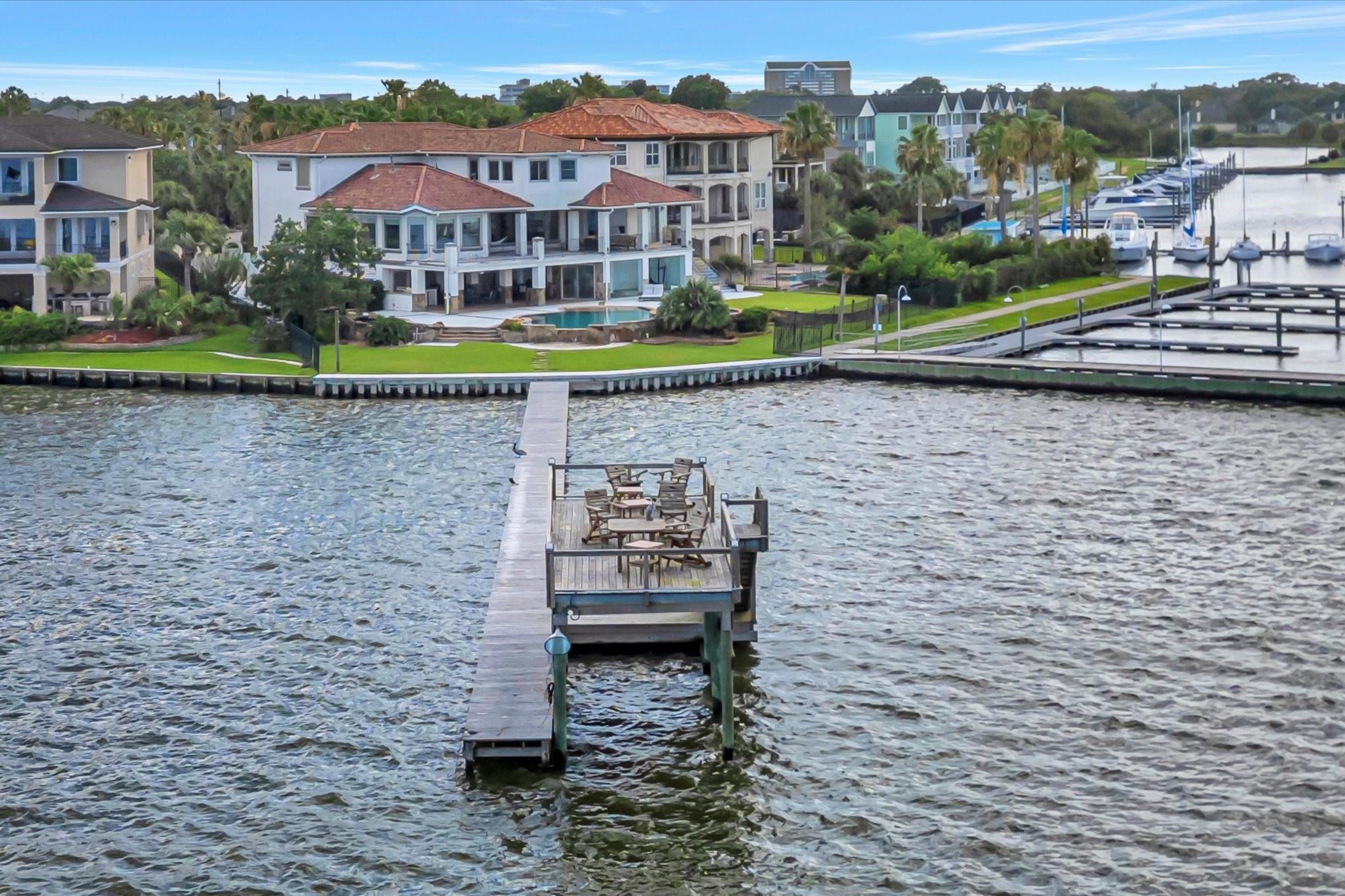 Image 3: THE 200' PIER AND 32' BOATHOUSE WITH SUNDECK IS A
