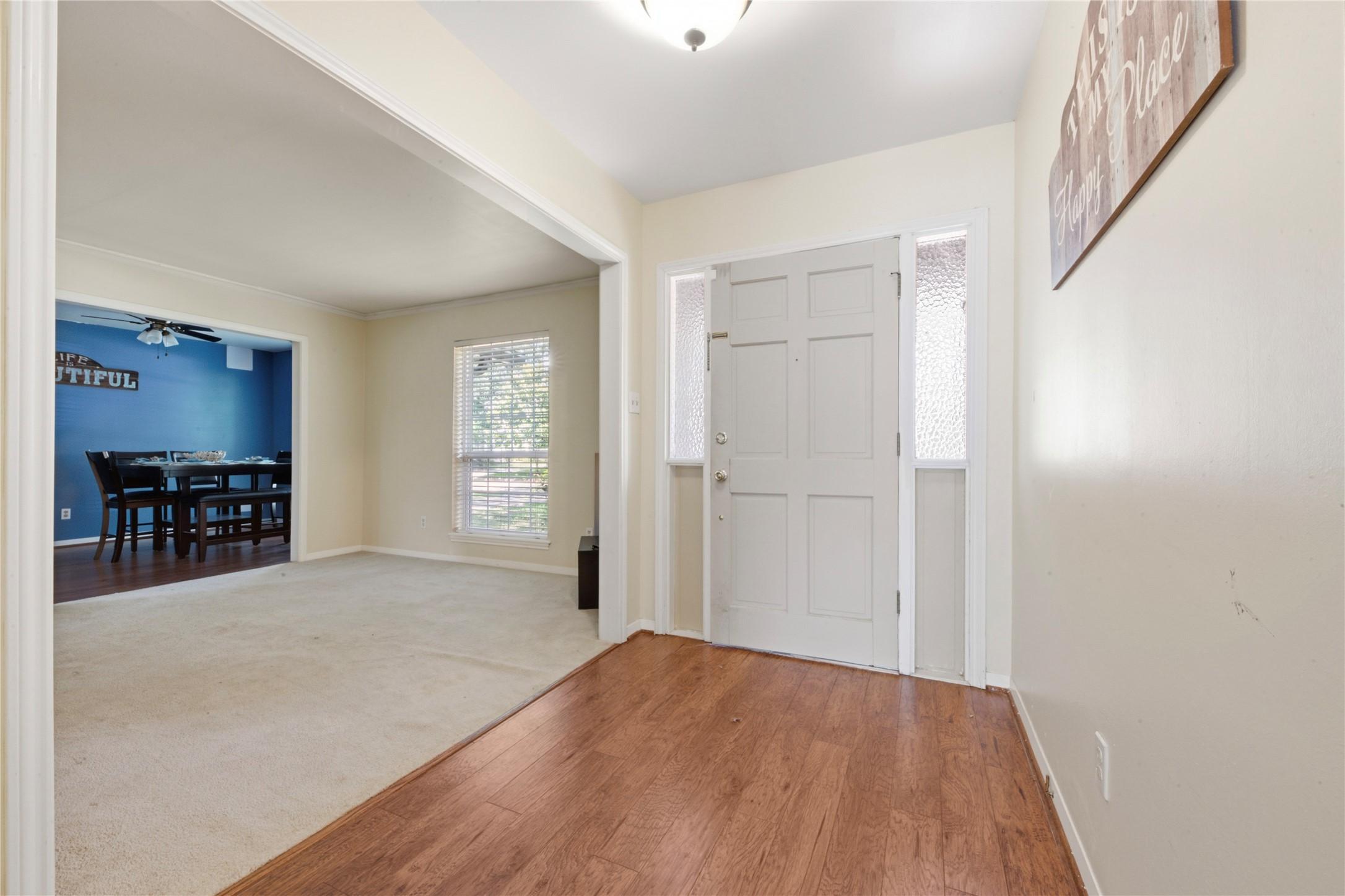 Image 4: Step inside to an inviting foyer that welcomes you