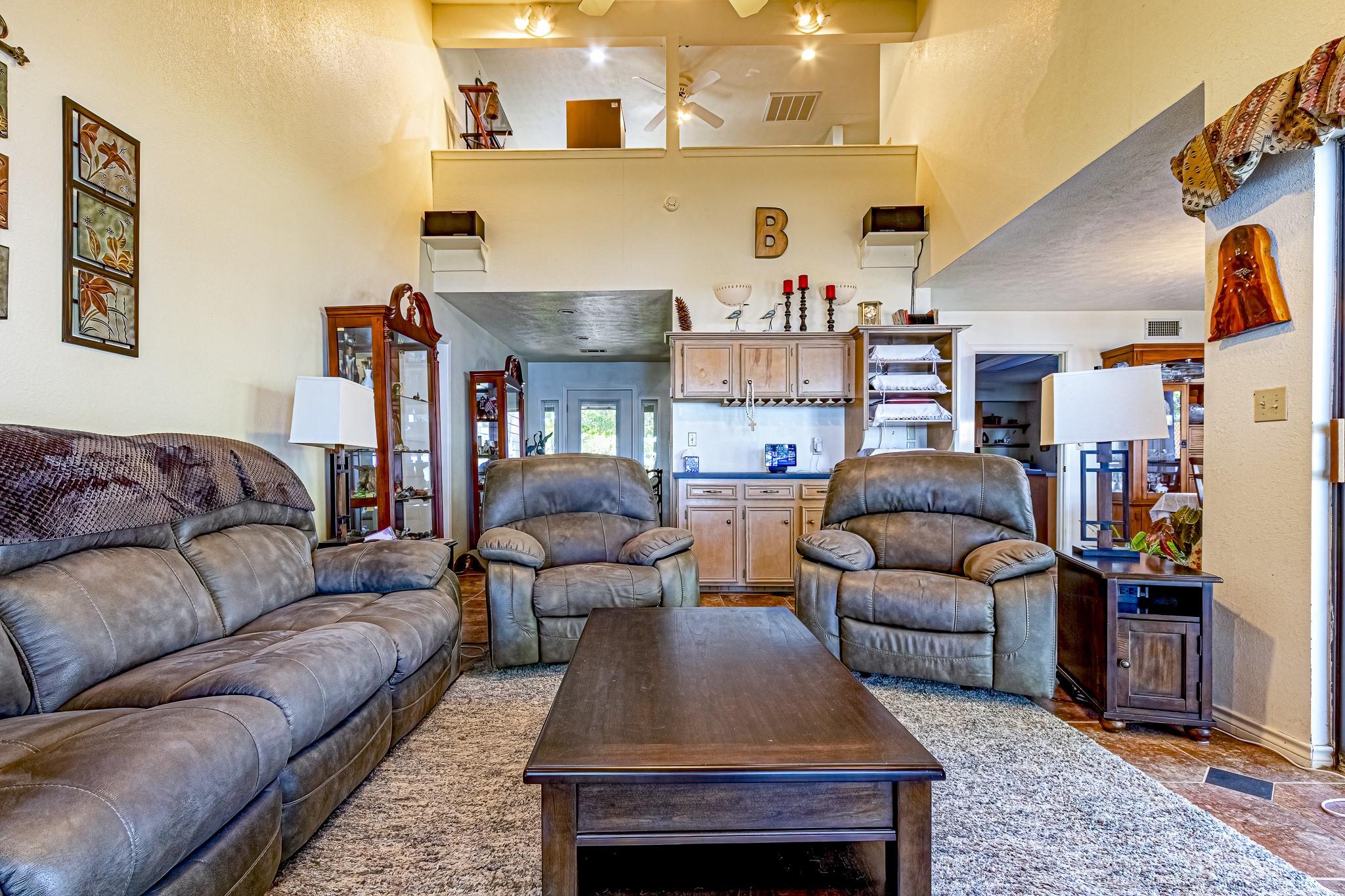 Image 4: Looking from the back door towards the front door.