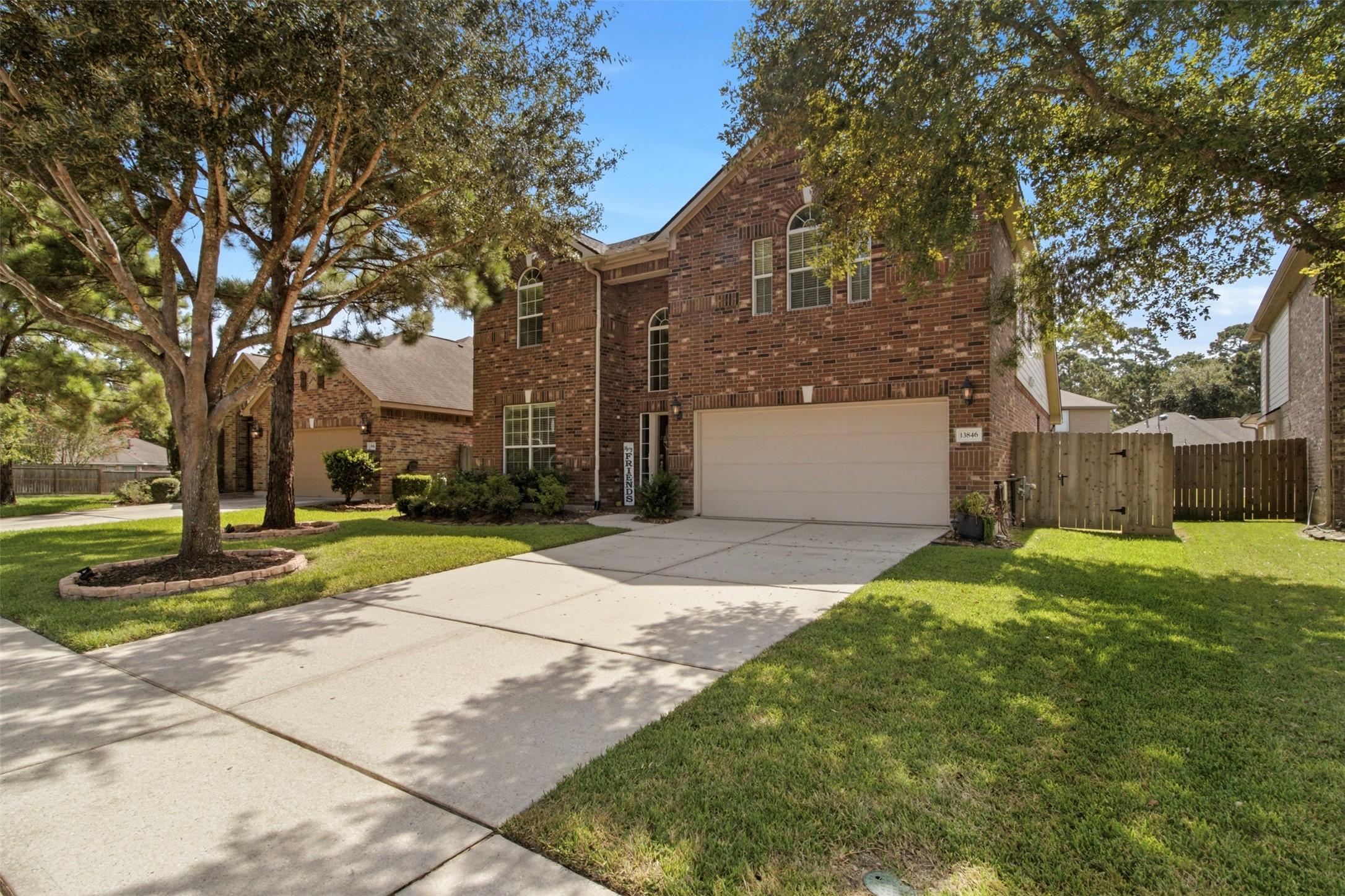 Image 1: Charming two-story brick home with a spacious driv