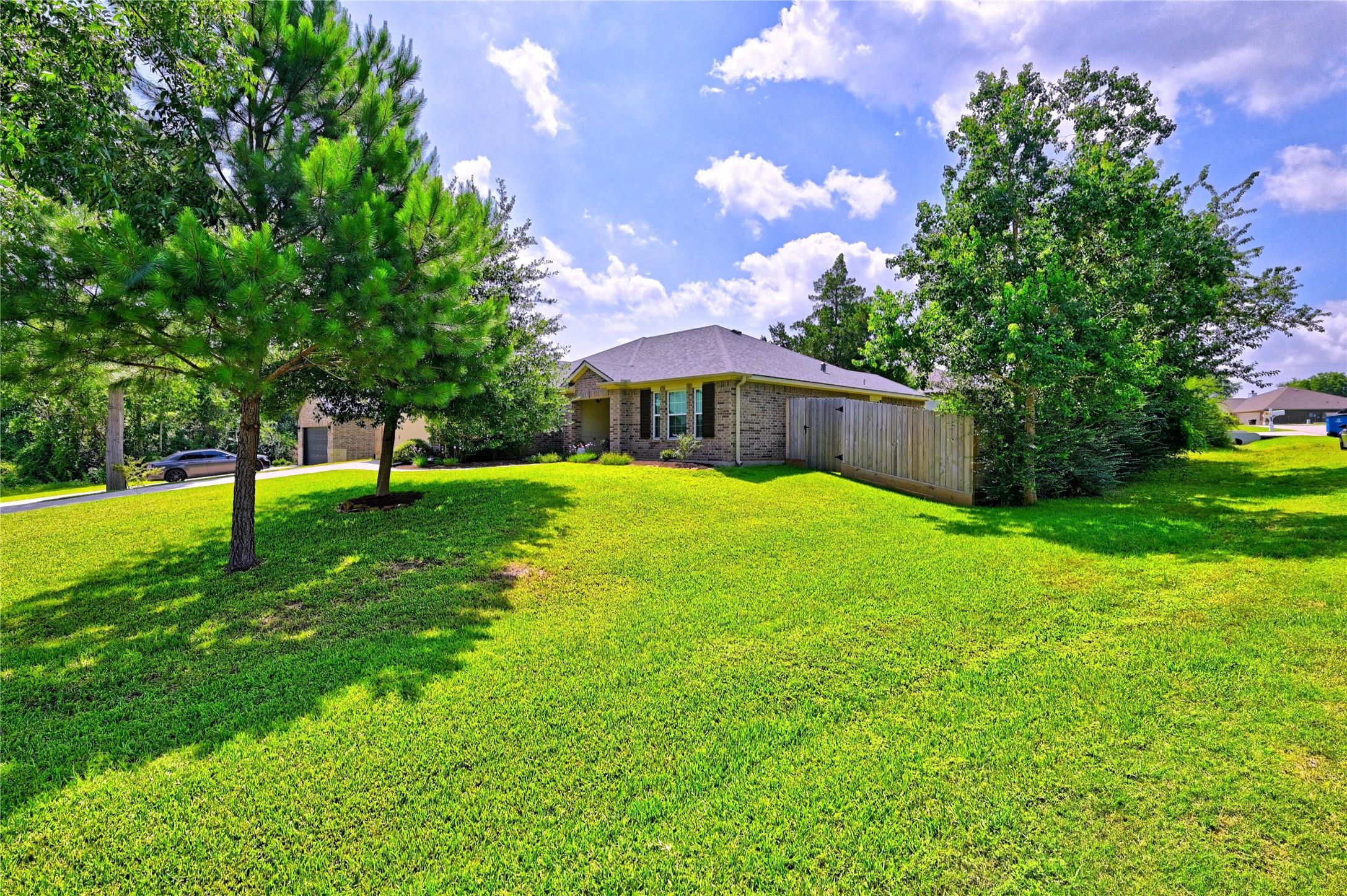Image 4: This photo showcases a charming one-story home wit