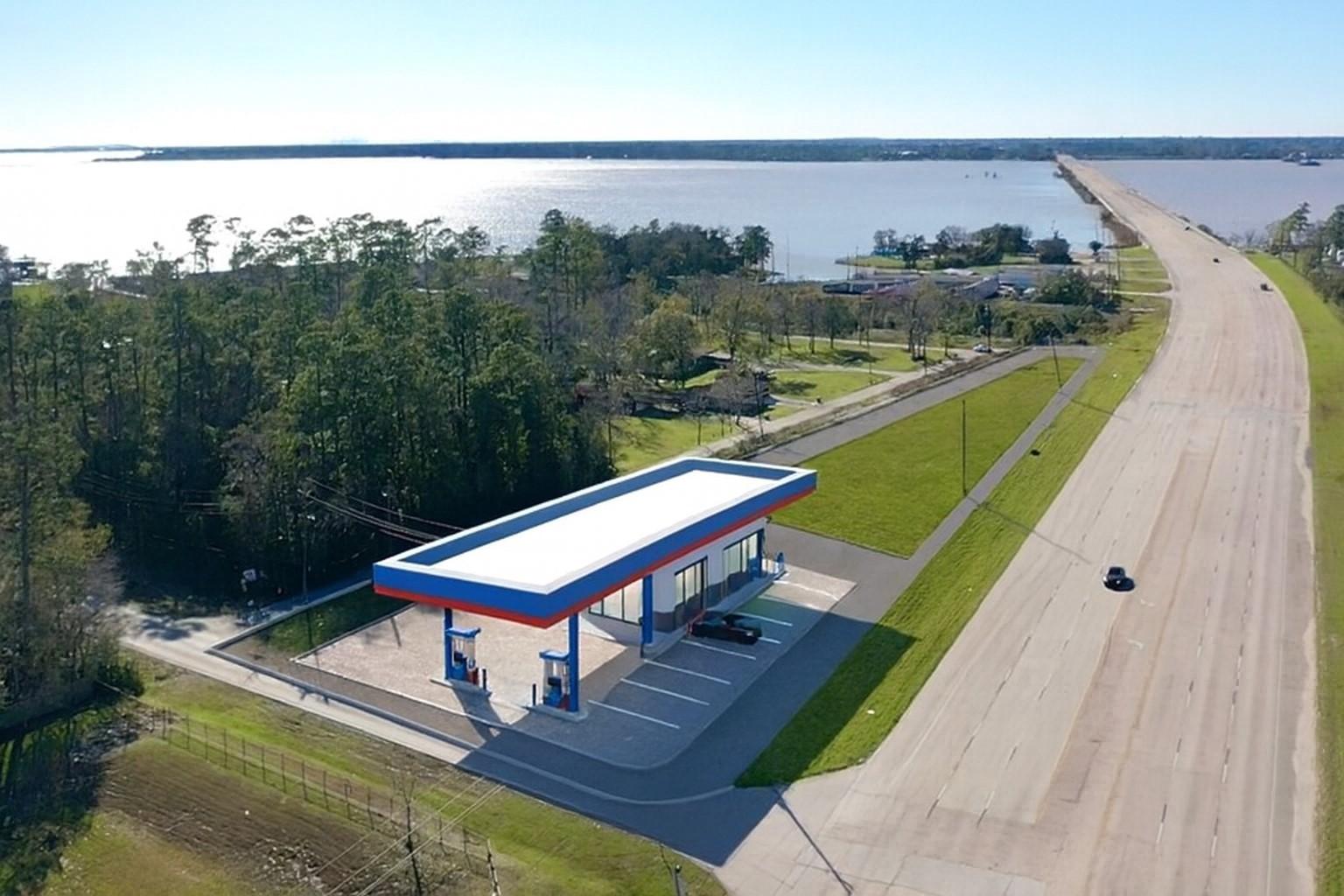 Image 1: Rendering of a gas station