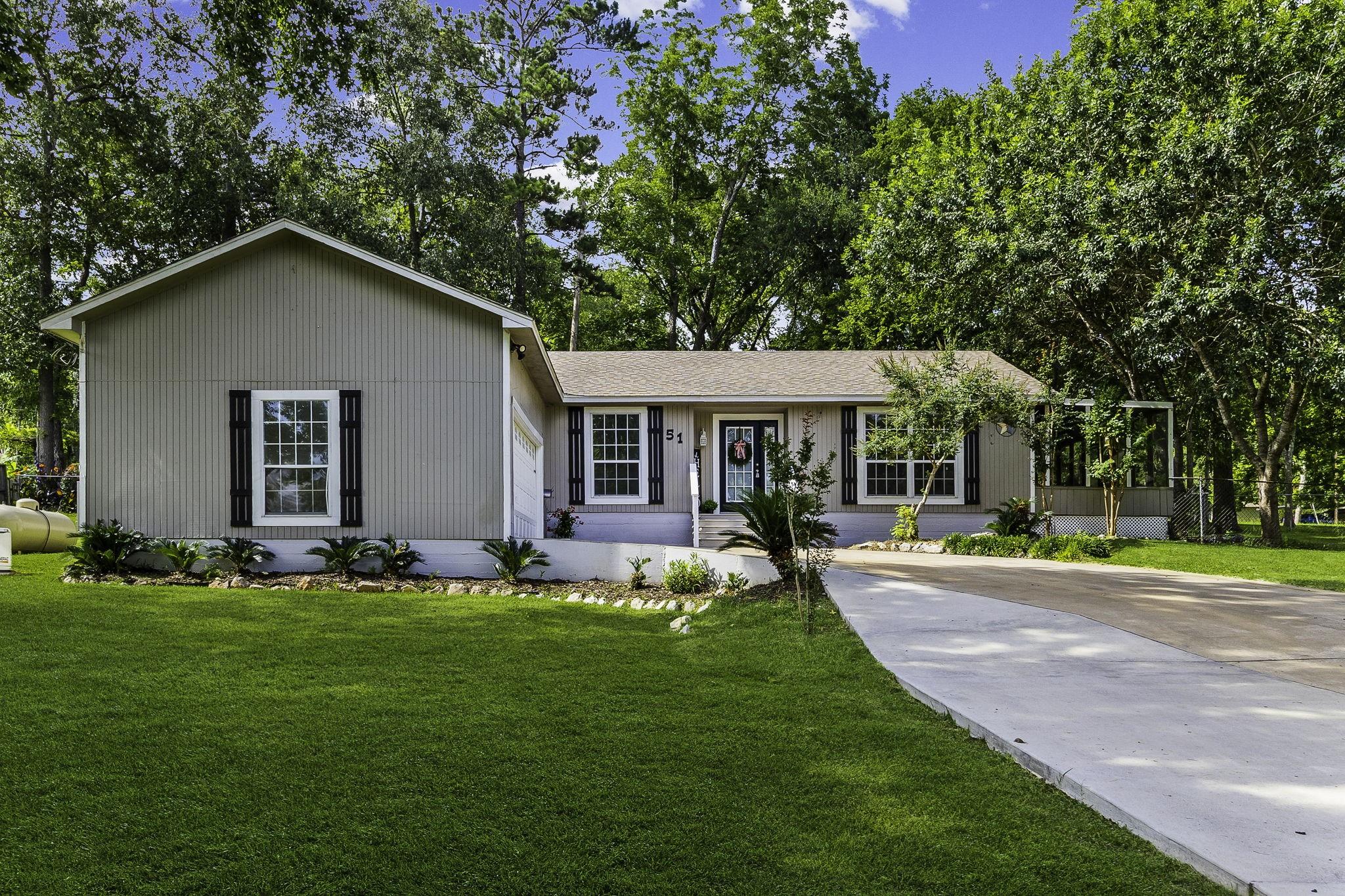 Image 1: Home itself sits on Lot 15 (one of 3 full lots tha
