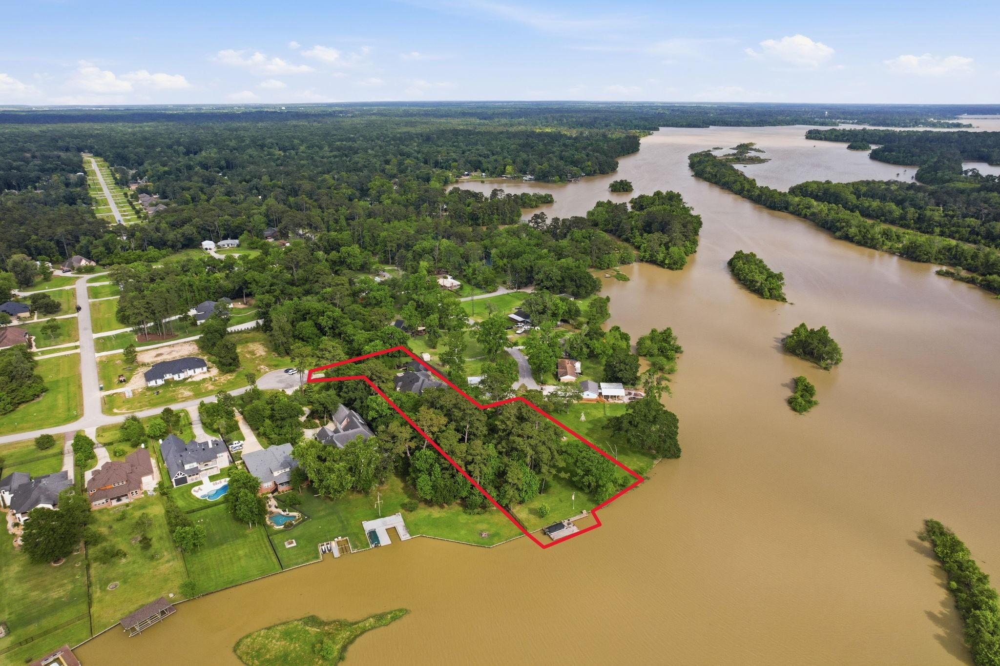 Image 4: Aerial view of waterfront property.  Home sits at