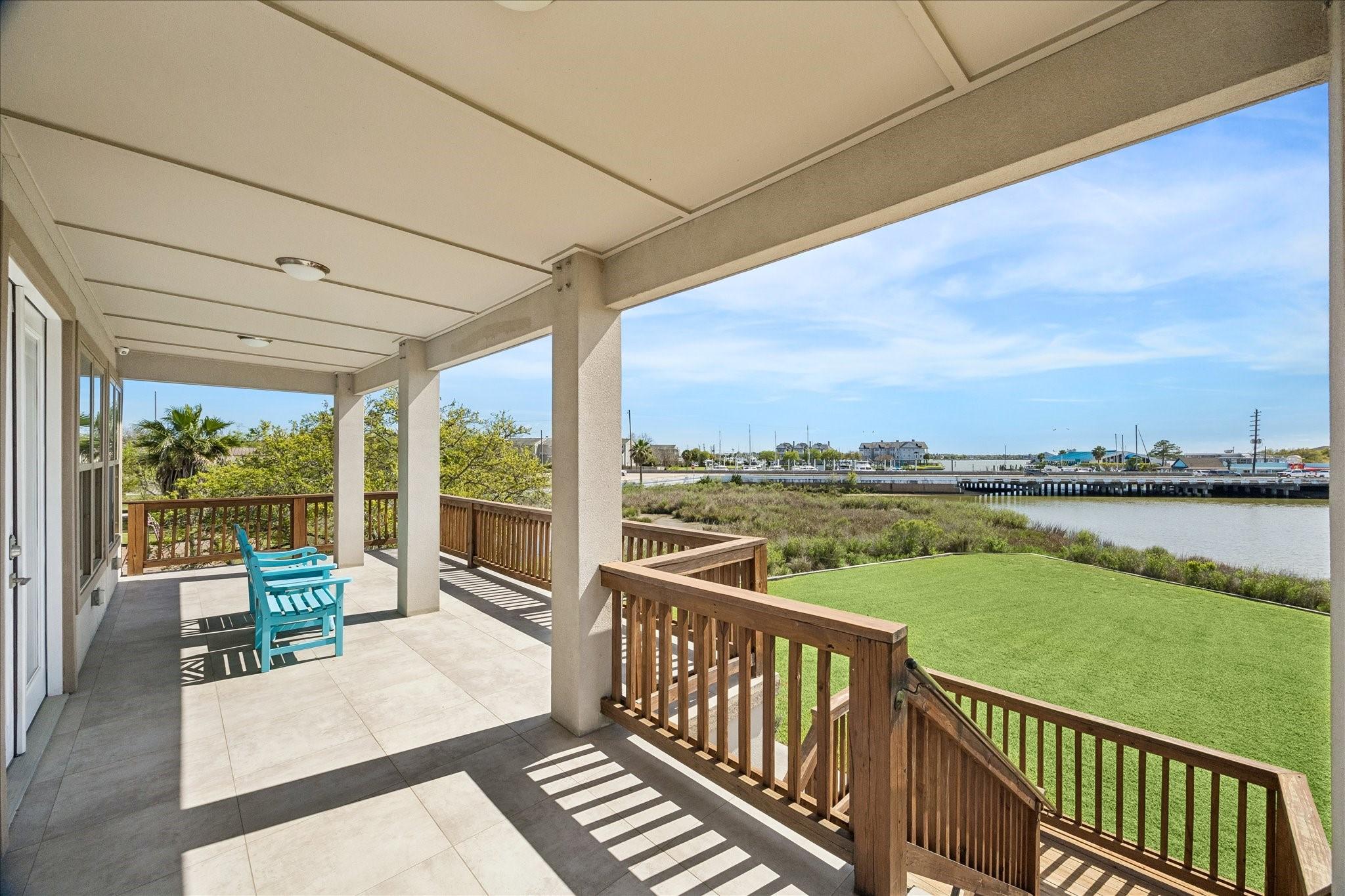 Image 3: A large balcony spans the width of the first livin