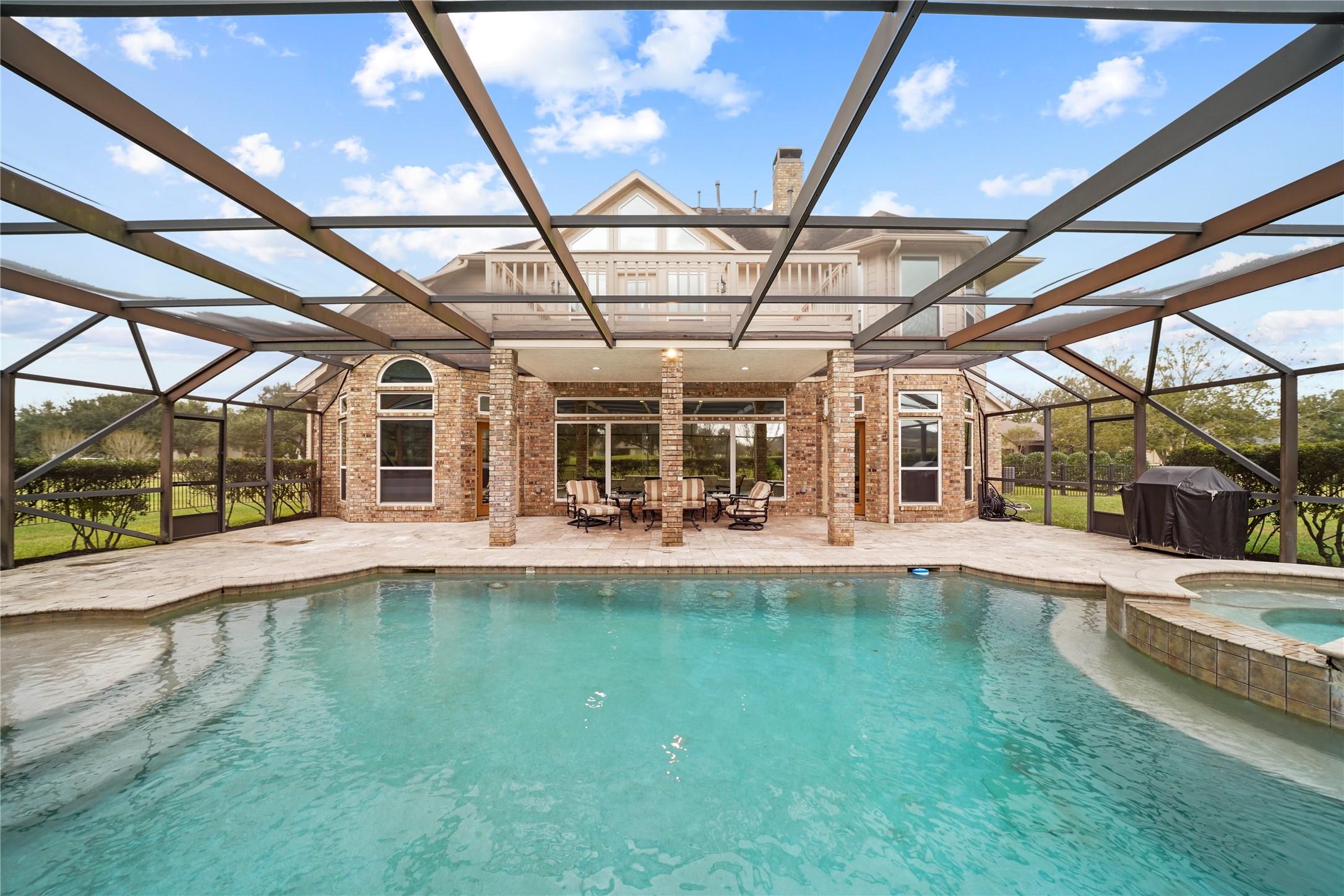 Image 3: Enjoy a private pool and spa just steps from the f