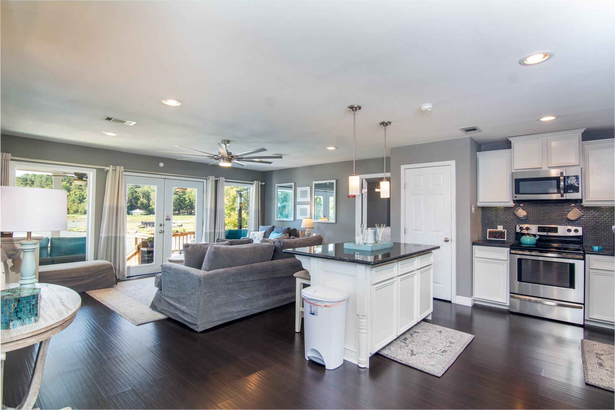 Image 2: Open layout connecting the kitchen and living area