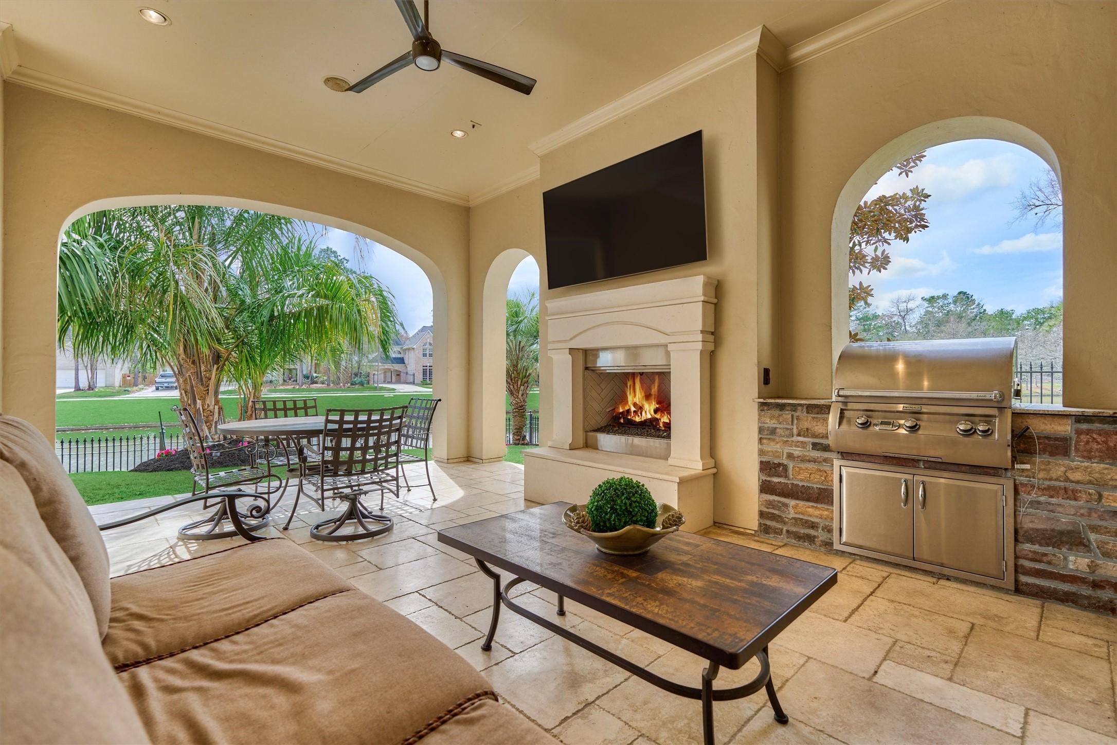 Image 4: Covered patio with dining and exterior living with