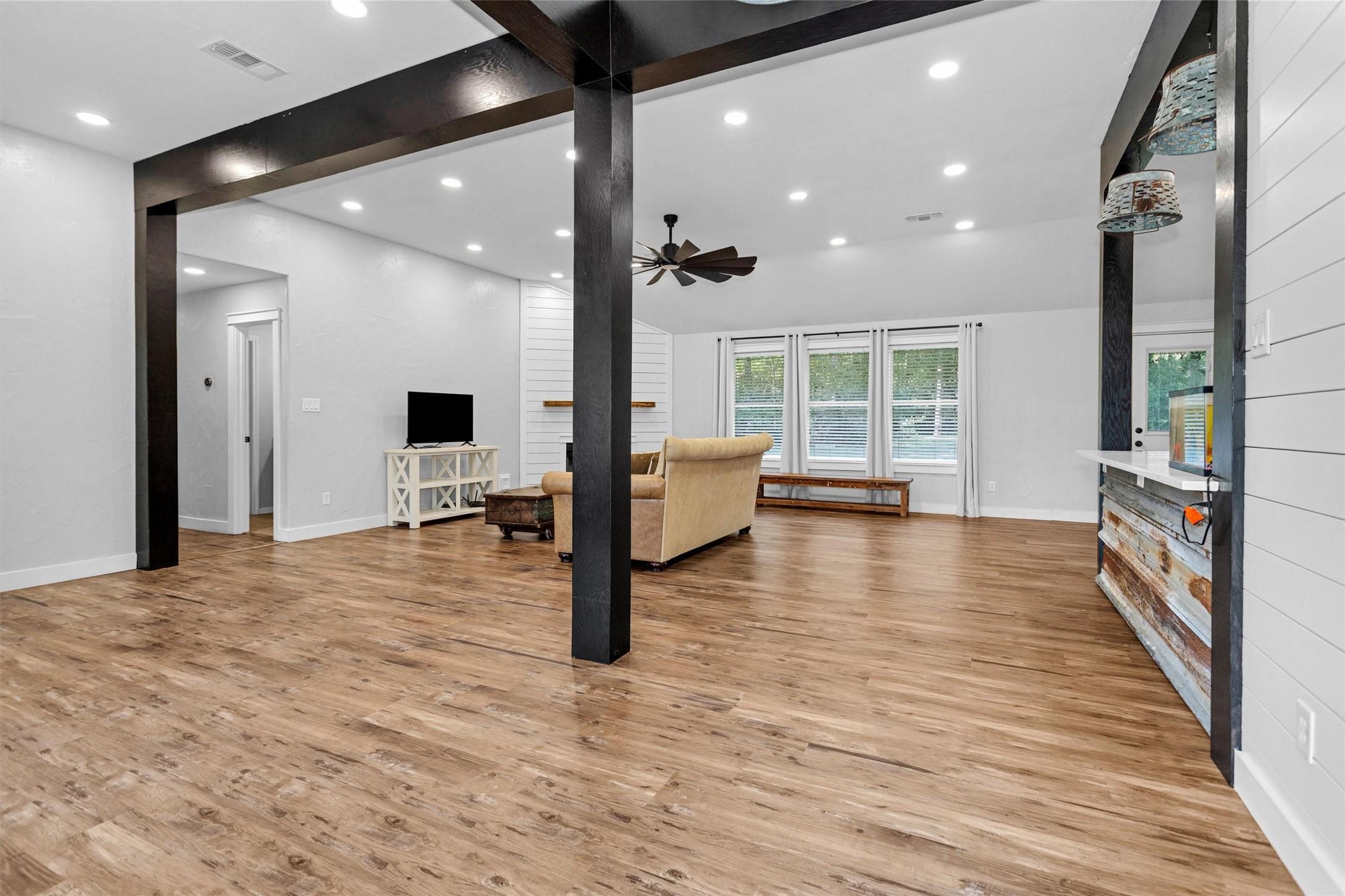 Image 3: Large open concept with living area and family roo