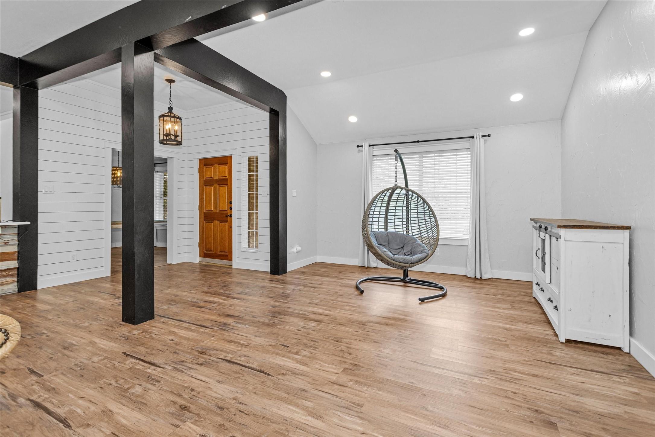Image 4: Open-concept living space filled with natural ligh