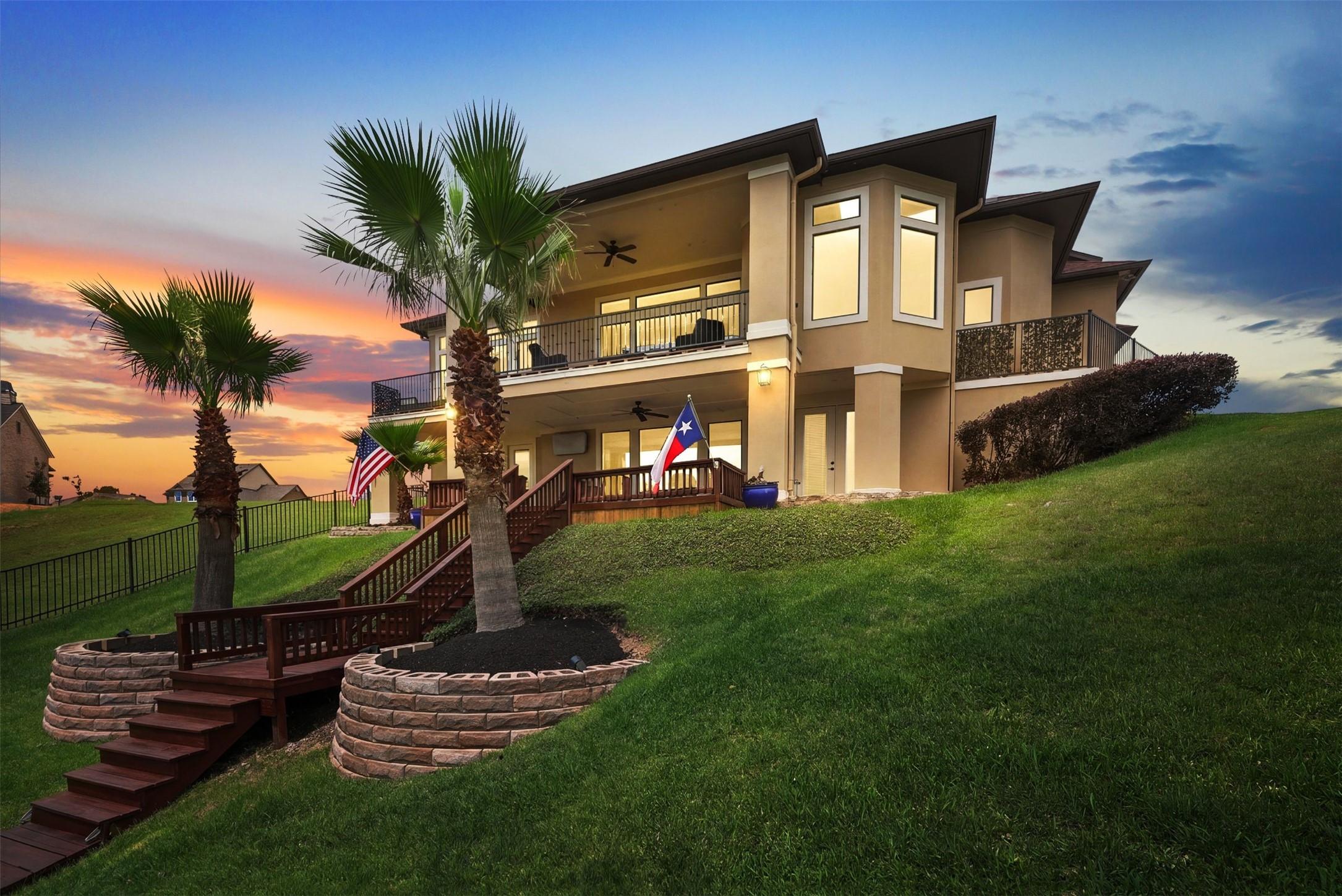 Image 1: This exquisite two-story home boasts modern design