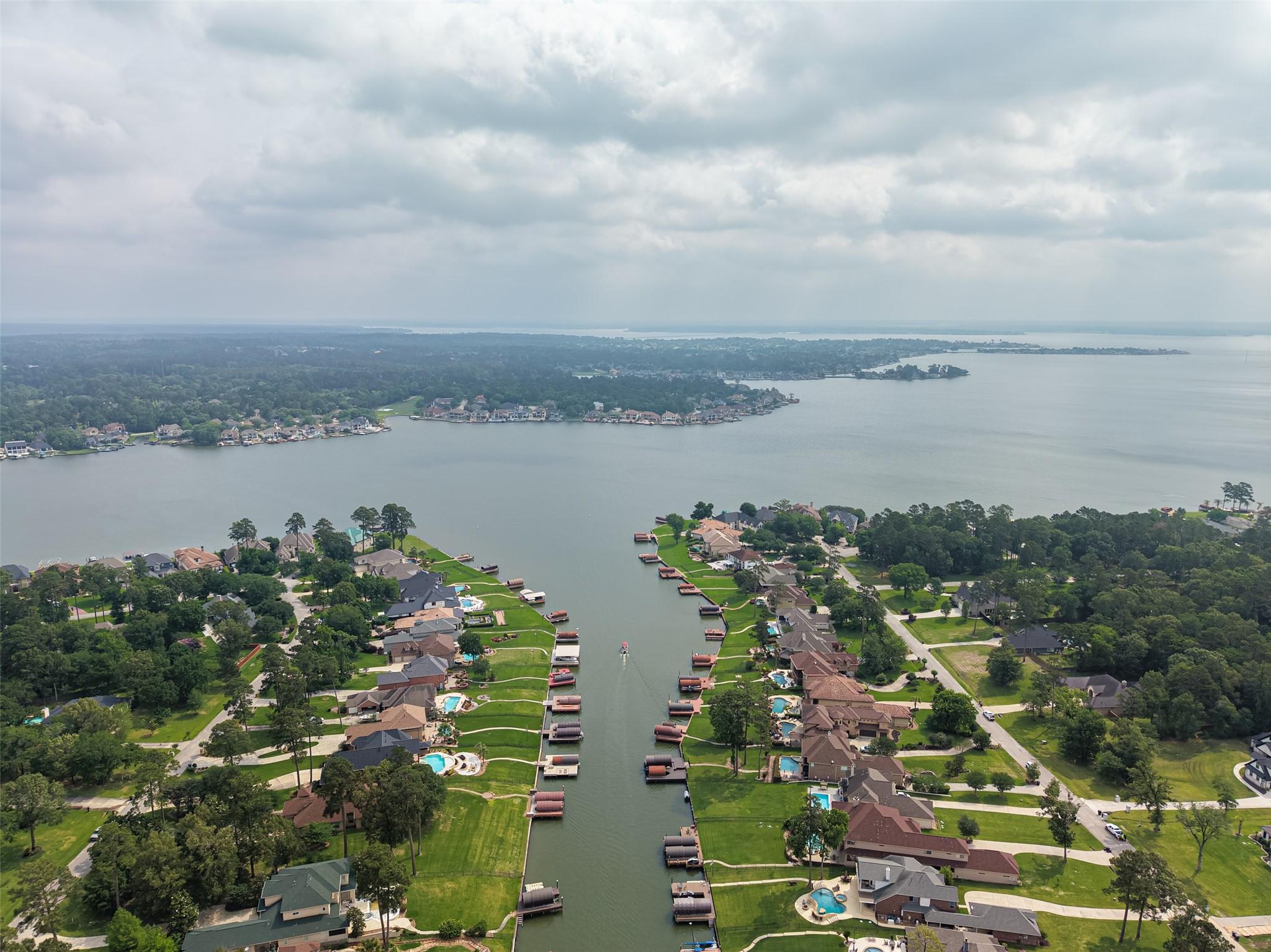 Image 4: This aerial view showcases a picturesque lakeside