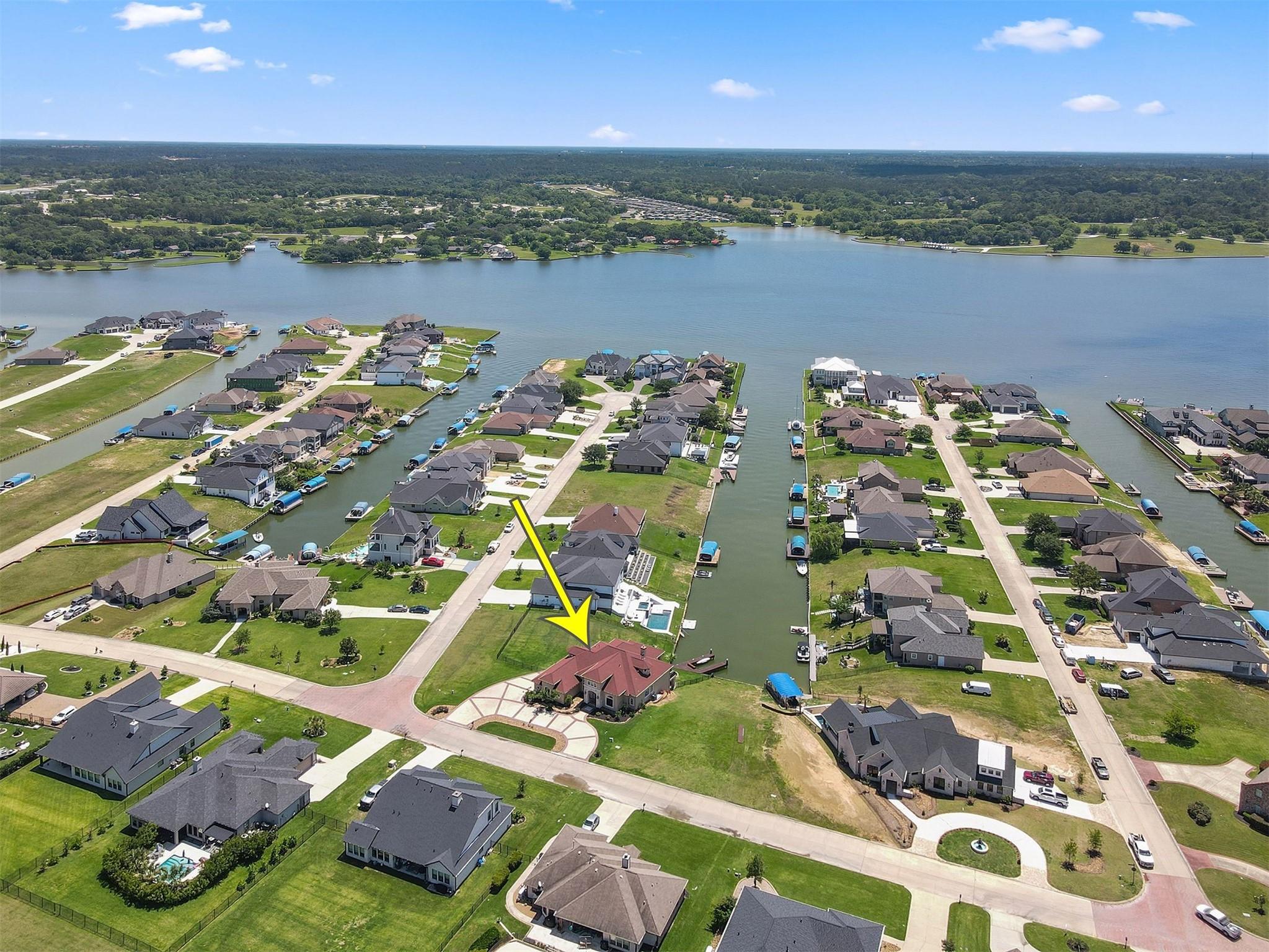 Image 3: Discover serene lakeside living in this picturesqu