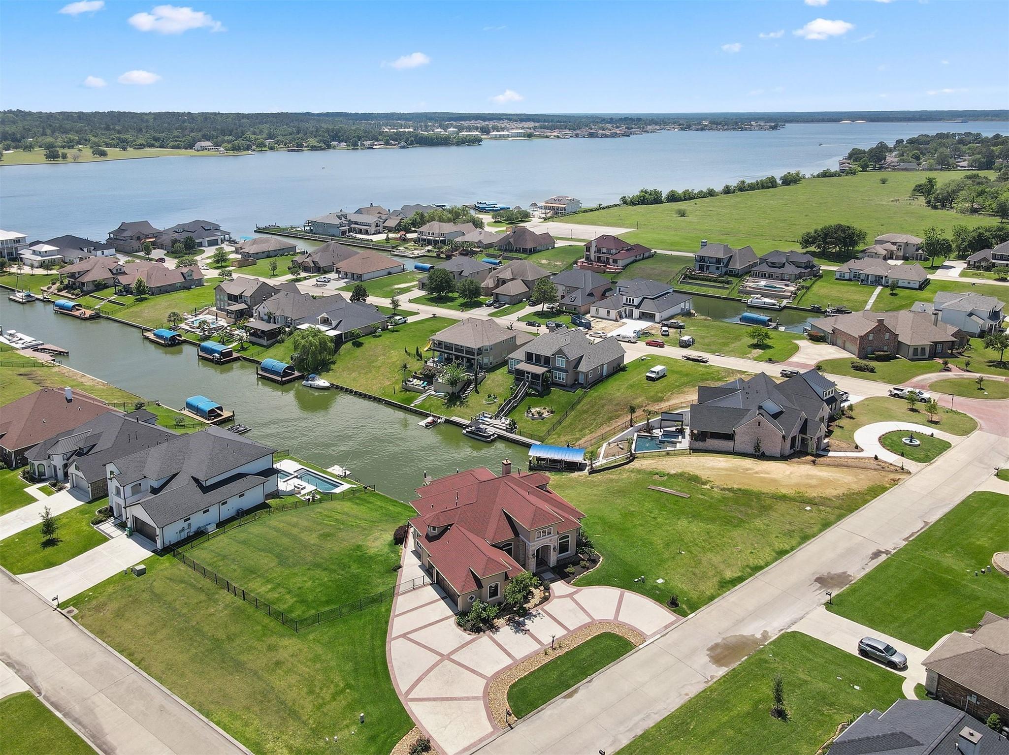 Image 4: Nestled in a serene lakeside neighborhood, this ae