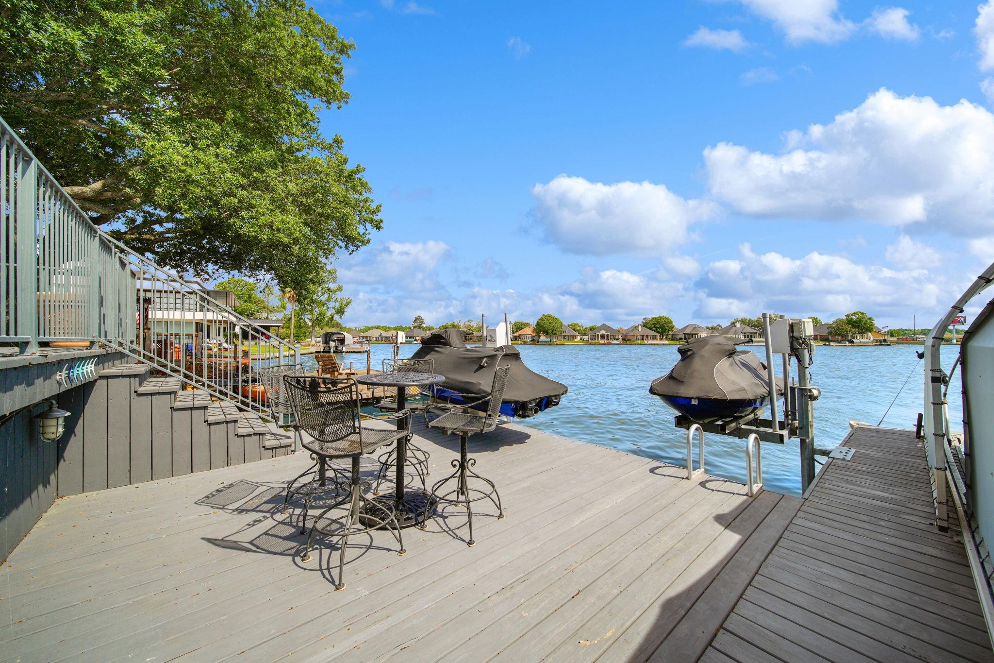 Image 3: Back patio overlooking Lake Conroe