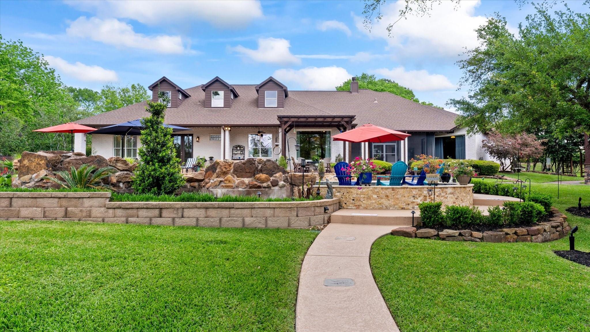 Image 2: This home features a pergola, swimming pool and a