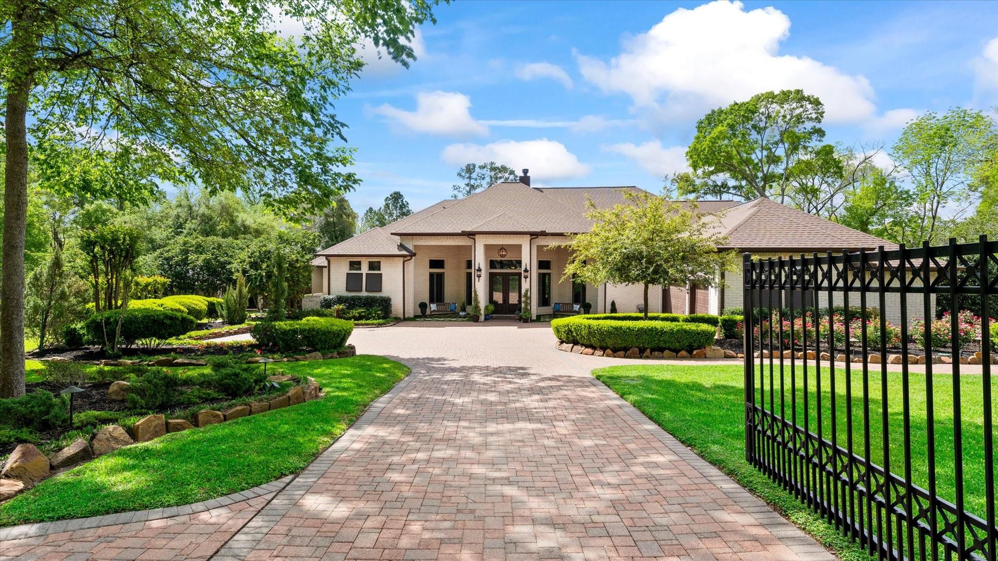 Image 3: This home is immaculately maintained with a brick