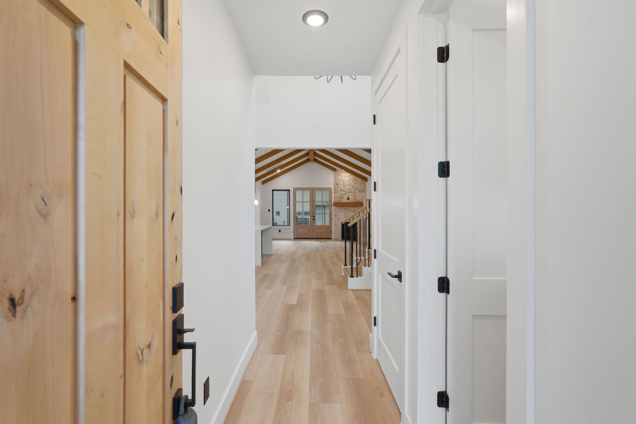 Image 2: Step through the Andersen knotty alder doors into