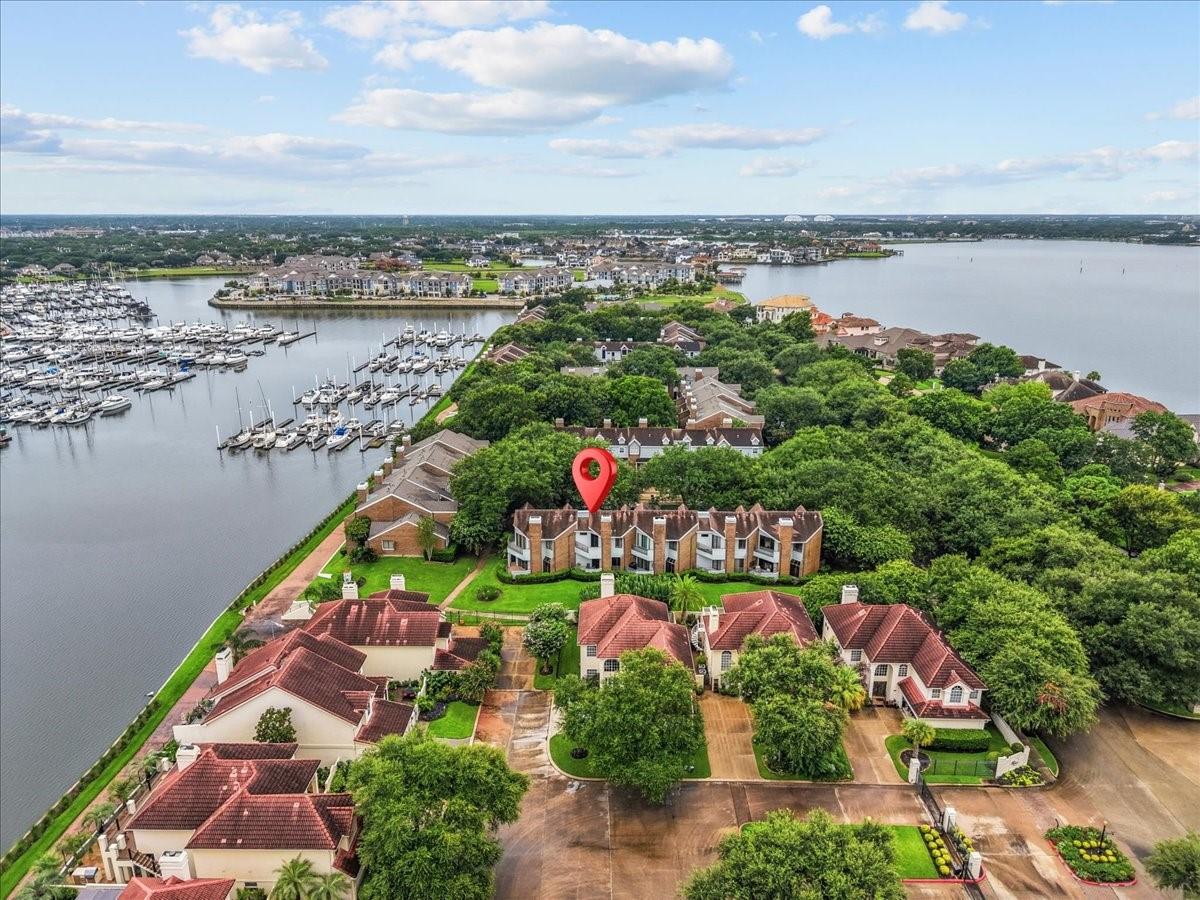 Image 1: Aerial view showcasing the property's water views