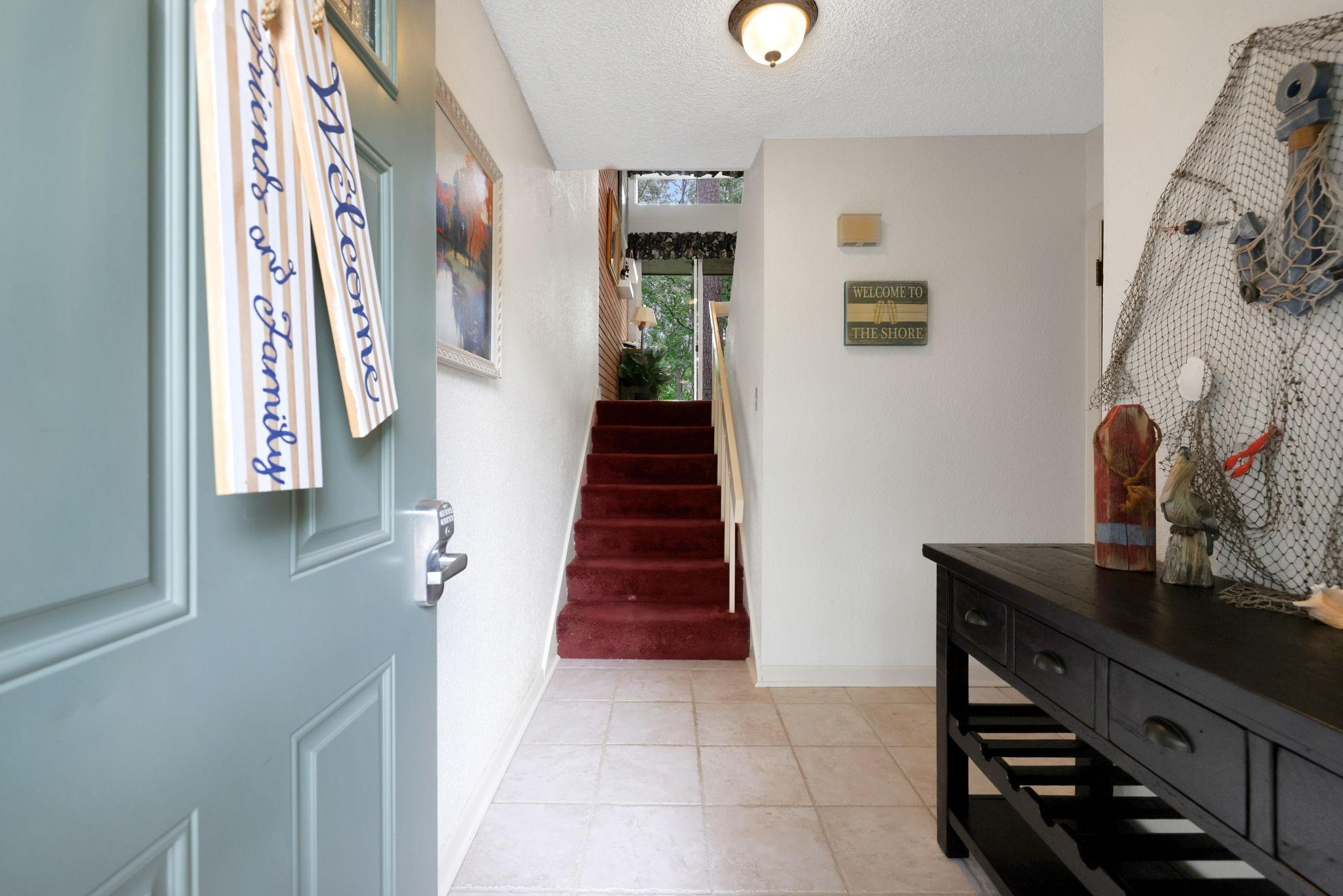 Image 4: Welcome into this inviting foyer on first floor