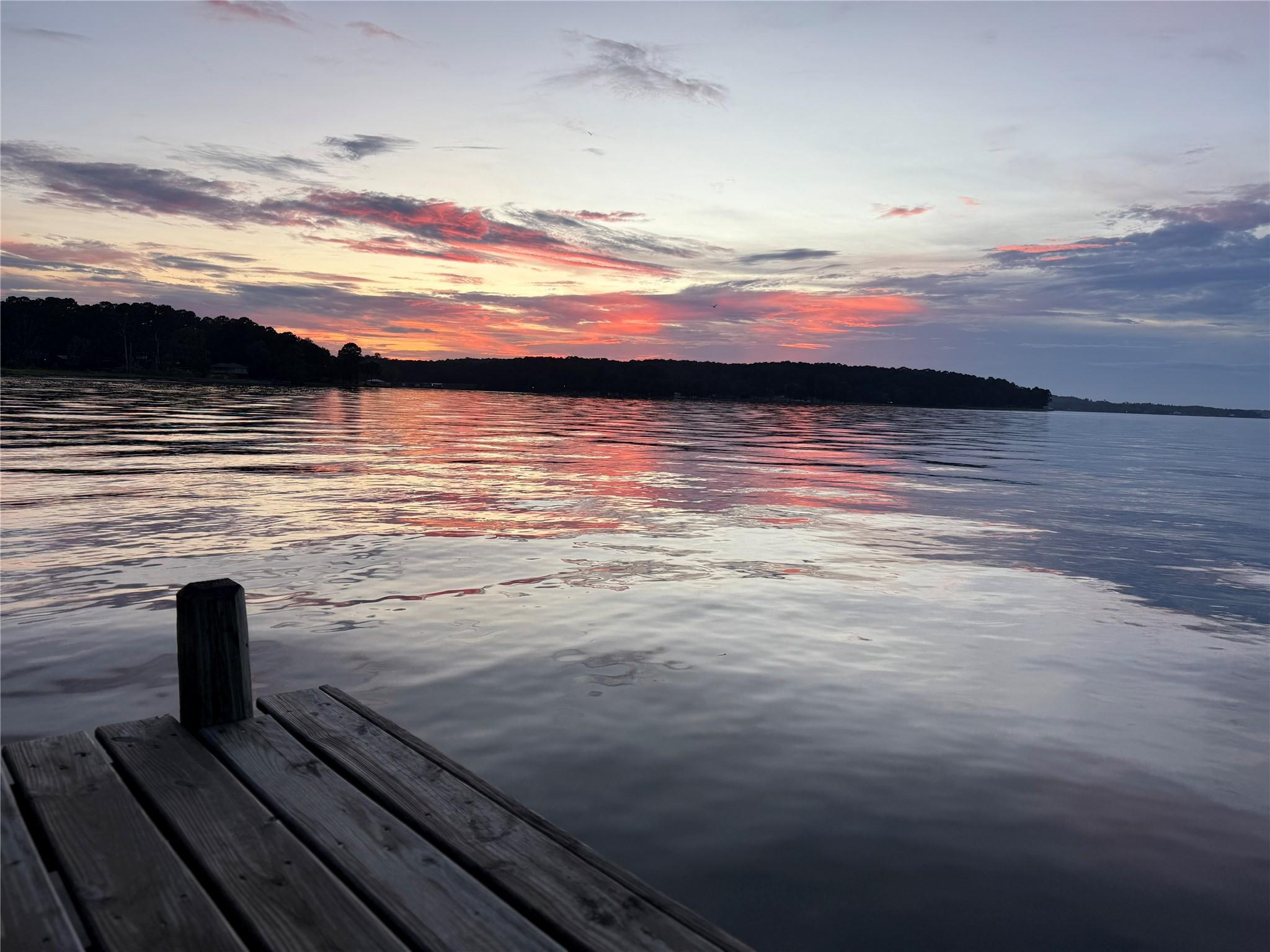 Image 4: Enjoy the beautiful sunsets from the boat house or