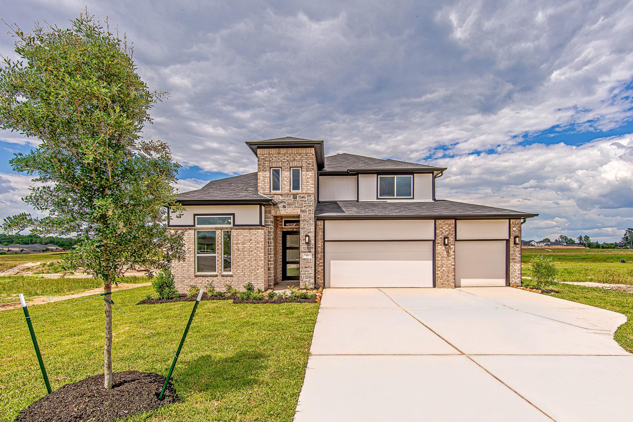 Image 2: A striking modern exterior with clean lines and a