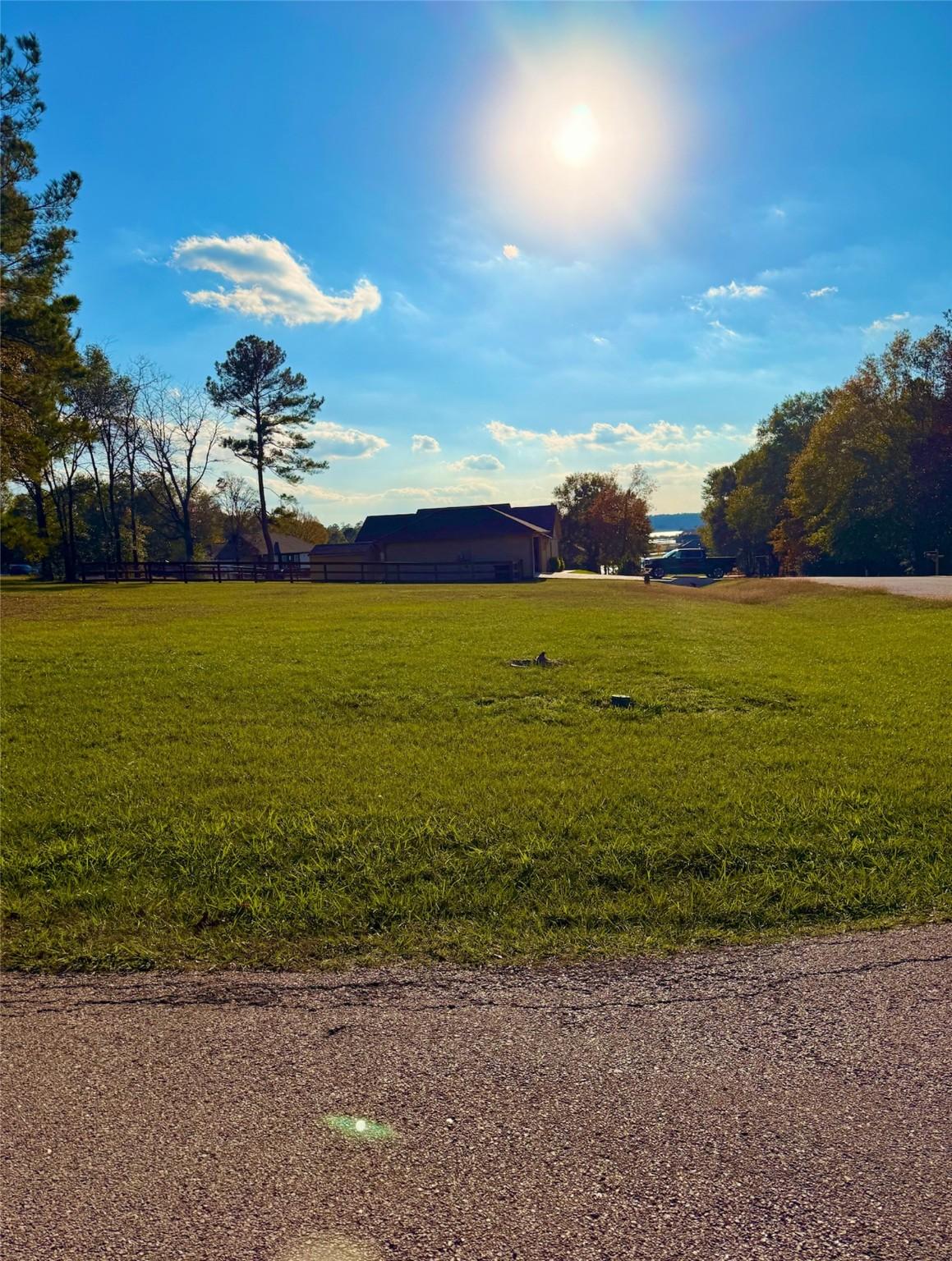 Image 2: BEAUTIFUL corner lot with a "peek a boo" water vie