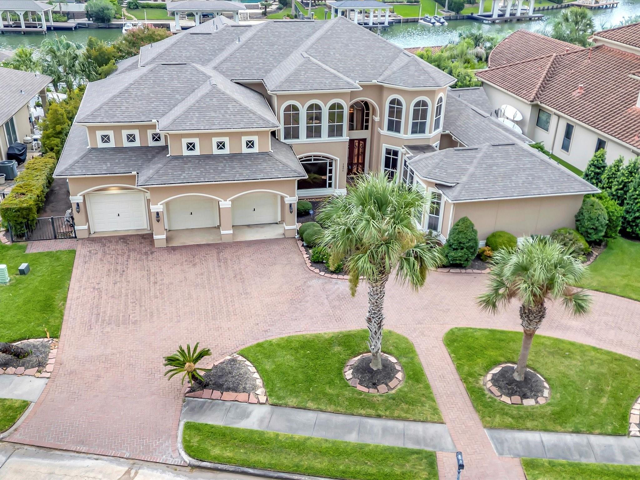 Image 2: Impressive curb appeal welcomes you to this statel