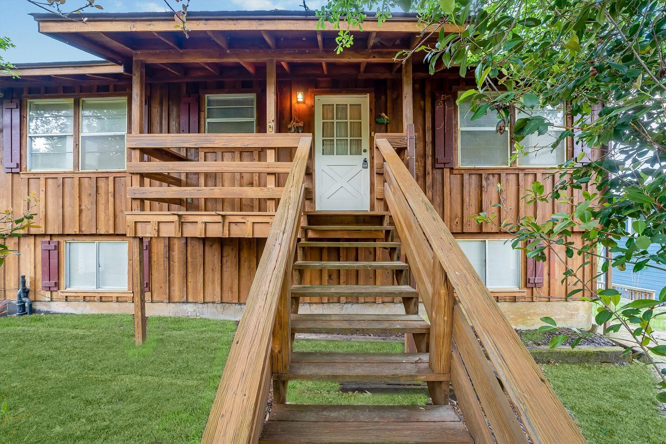 Image 3: Elevated approach to a welcoming front entry.