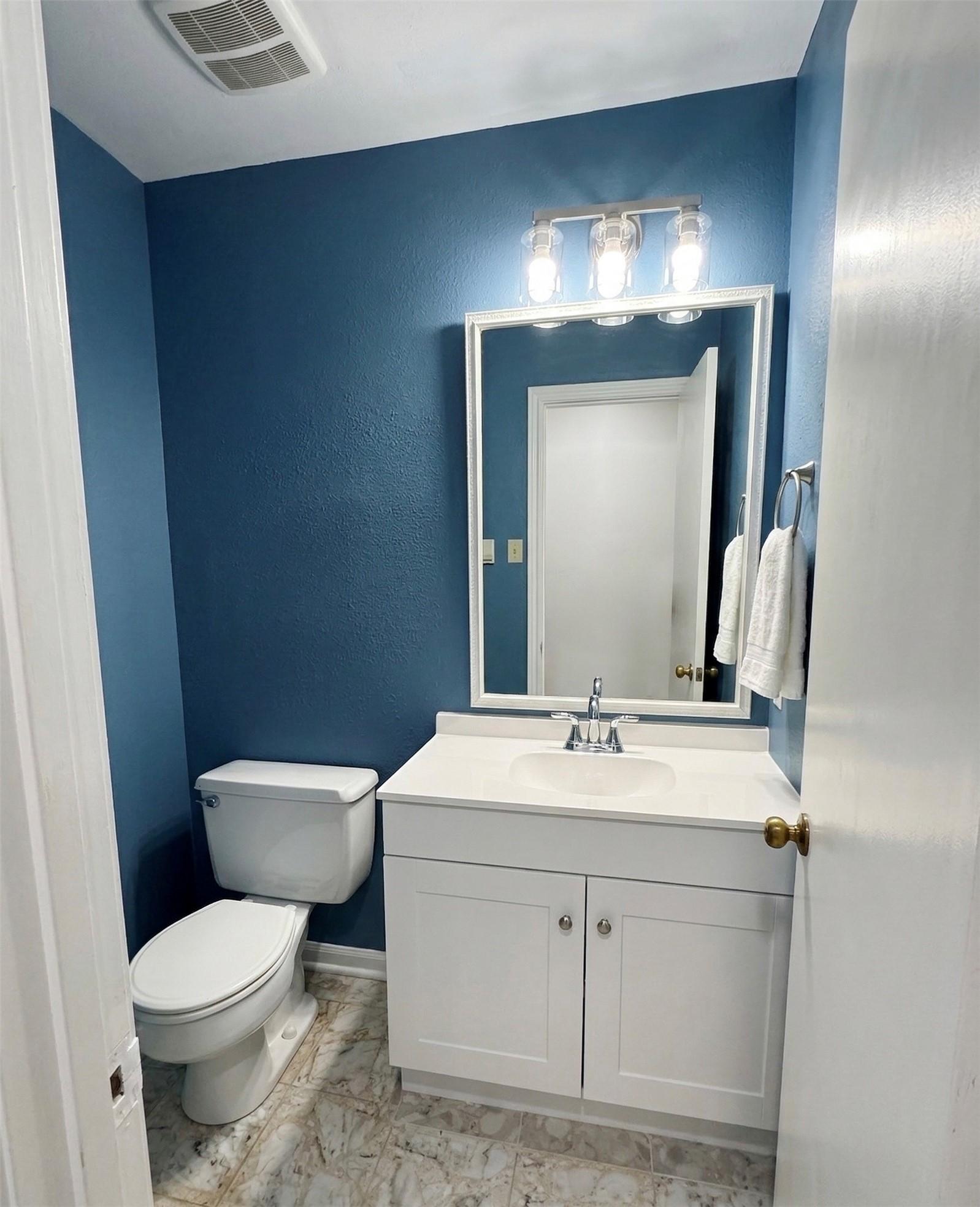 Image 4: Half Bath located on the first floor