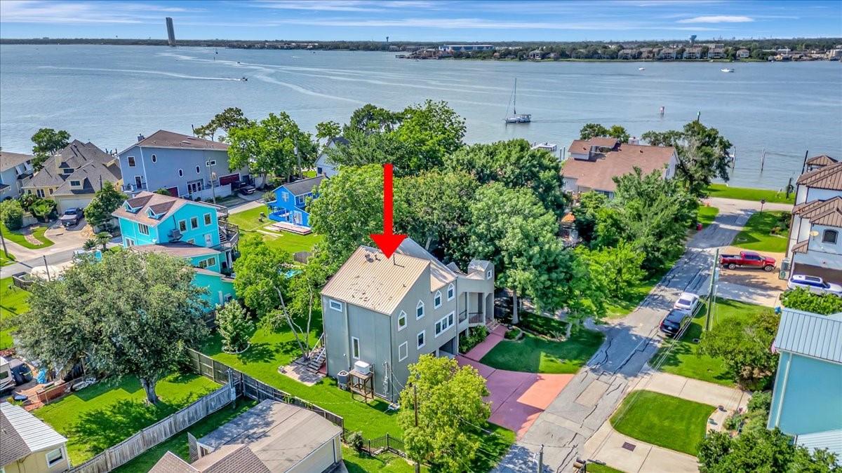 Image 1: AERIAL VIEW OF THE EXTRA-LARGE LOT JUST STEPS AWAY