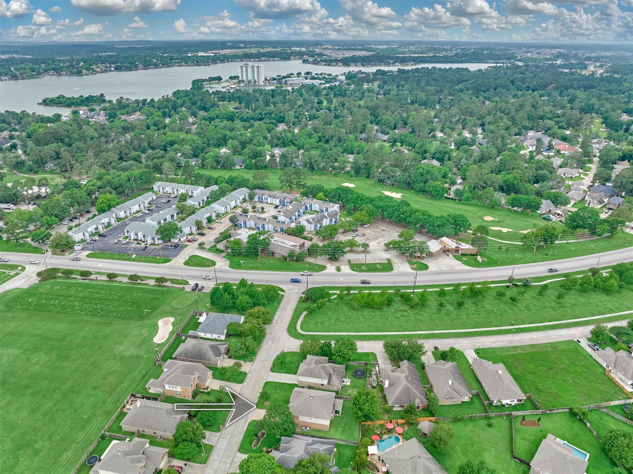 Image 4: Aerial view showcasing the oversized lot and prime
