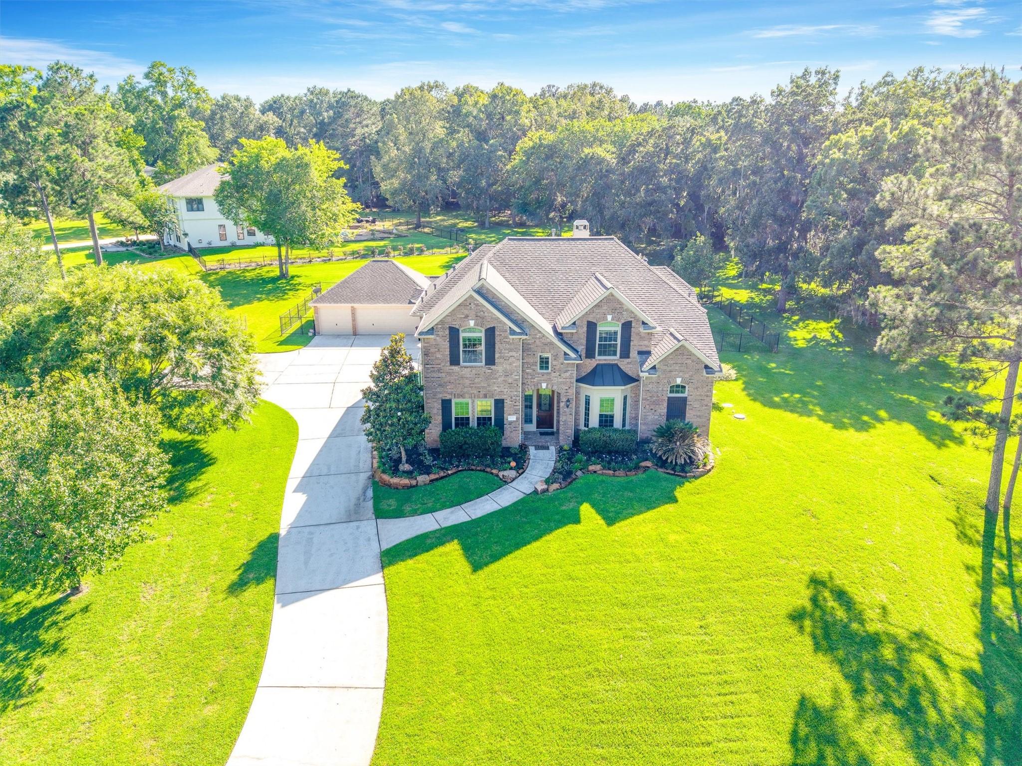 Image 2: This stunning aerial view highlights the front of